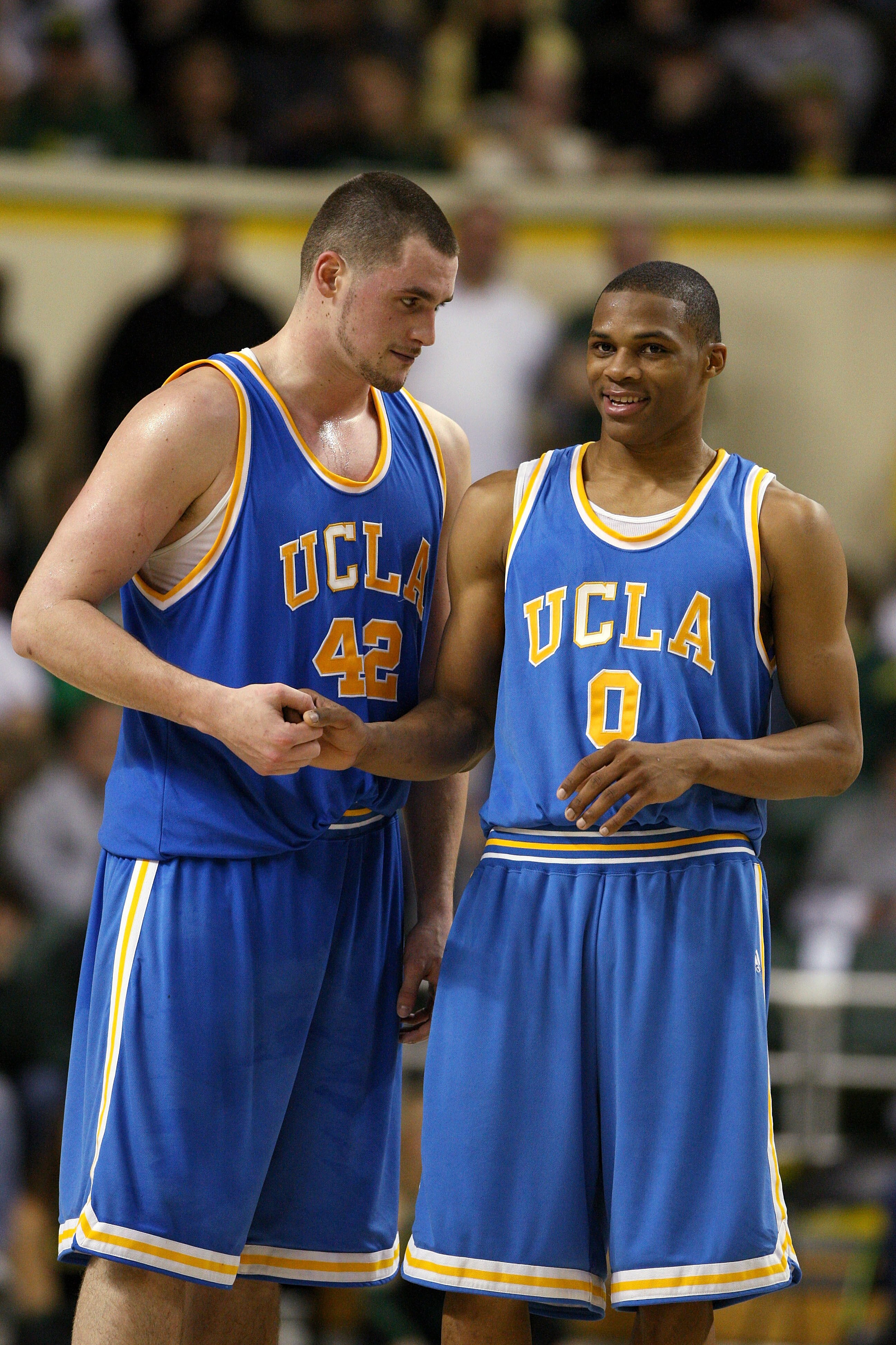 EUGENE, OR - JANUARY 24: Kevin Love #42 and Russell Westbrook #0 of the UCLA Bruins celebrate together against the Oregon Ducks at MacArthur Court January 24, 2008 in Eugene, Oregon.  (Photo by Jonathan Ferrey/Getty Images)