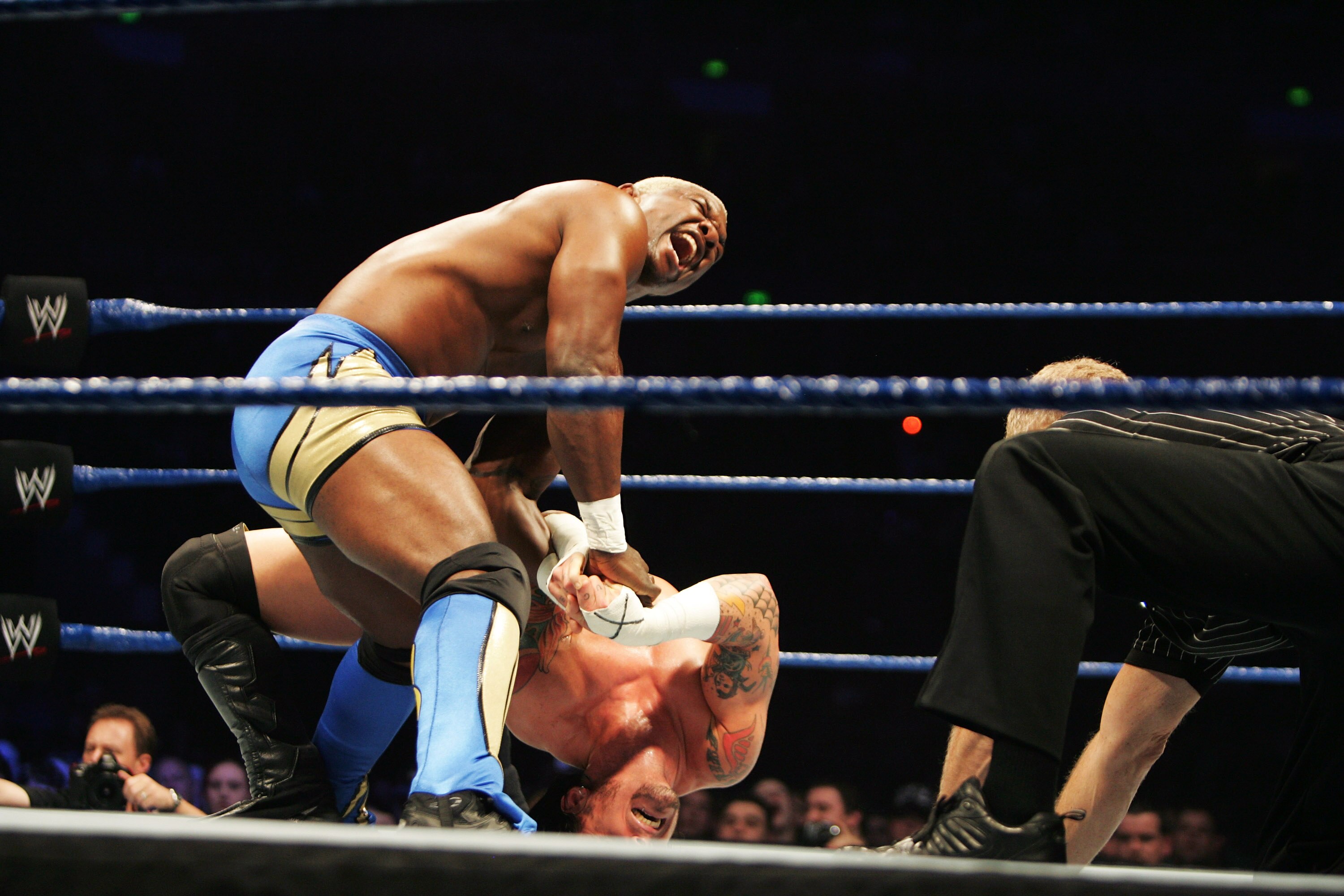 SYDNEY, AUSTRALIA - JUNE 15:  CM Punk trys to bridge out against Shelton Benjamin during WWE Smackdown at Acer Arena on June 15, 2008 in Sydney, Australia.  (Photo by Gaye Gerard/Getty Images)