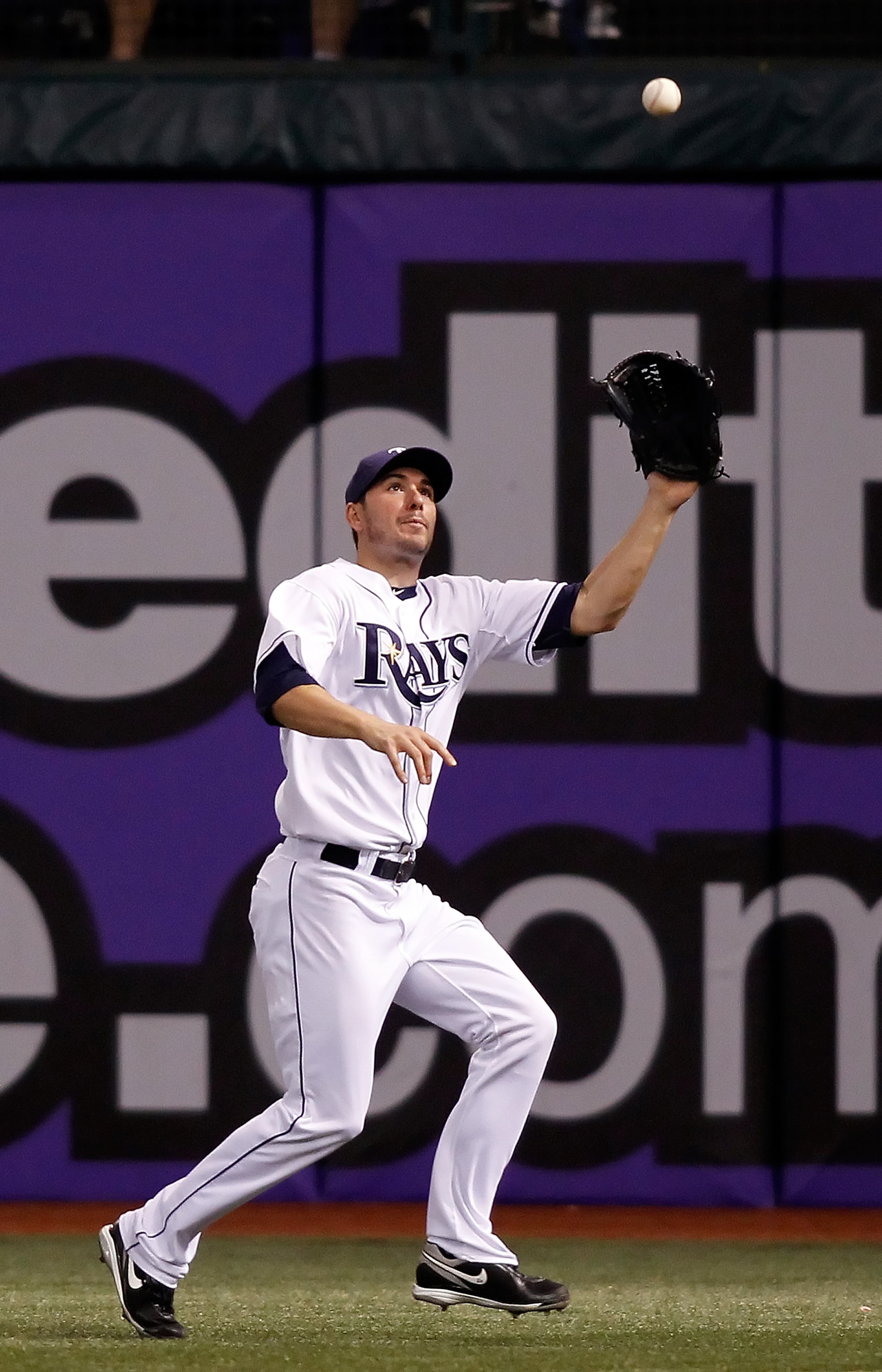 ST. PETERSBURG, FL - SEPTEMBER 28:  Outfielder Matt Joyce #20 of the Tampa Bay Rays catches a fly ball against the Baltimore Orioles during the game at Tropicana Field on September 28, 2010 in St. Petersburg, Florida.  (Photo by J. Meric/Getty Images)