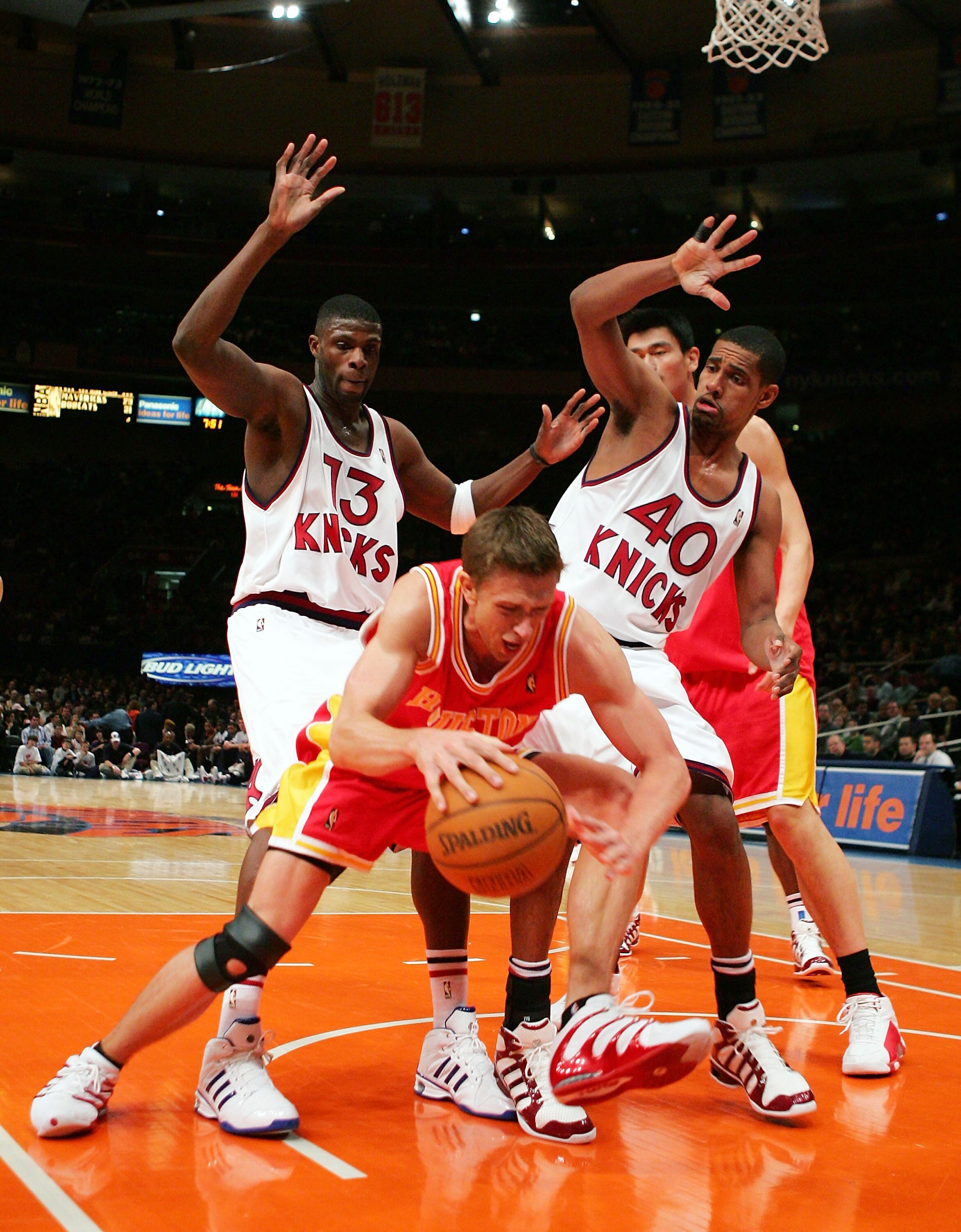NEW YORK - JANUARY 21:  Nazr Mohammed #13 and Kurt Thomas #40 of the New York Knicks surround Bob Sura #3 of the Houston Rockets on January 21, 2005 at Madison Square Garden in New York City. NOTE TO USER: User expressly acknowledges and agrees that, by d
