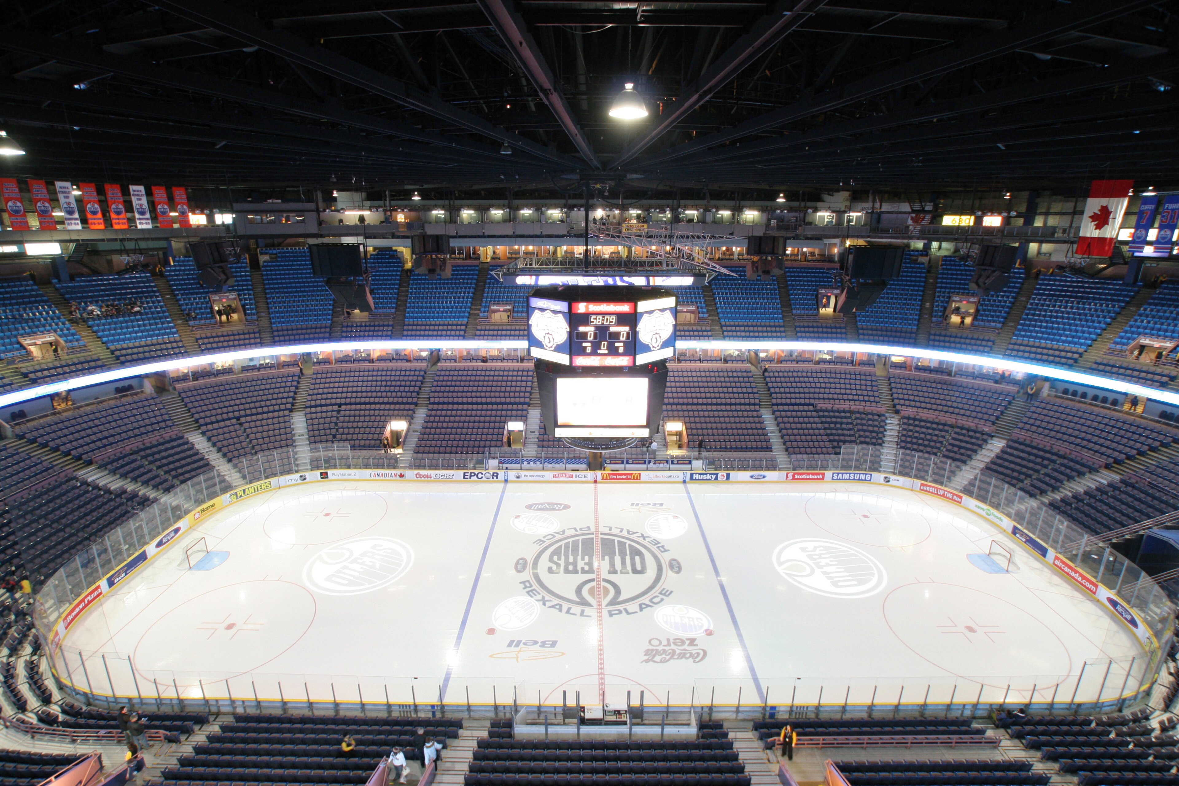 General view from the upper decks of the ice and seats at Rexall Place, a hockey and lacrosse venue and the home of the NHL's Edmonton Oilers, Edmonton, Alberta, Canada, mid 2000s. Rexall Products bought the naming rights of the arena in December 2003. (P