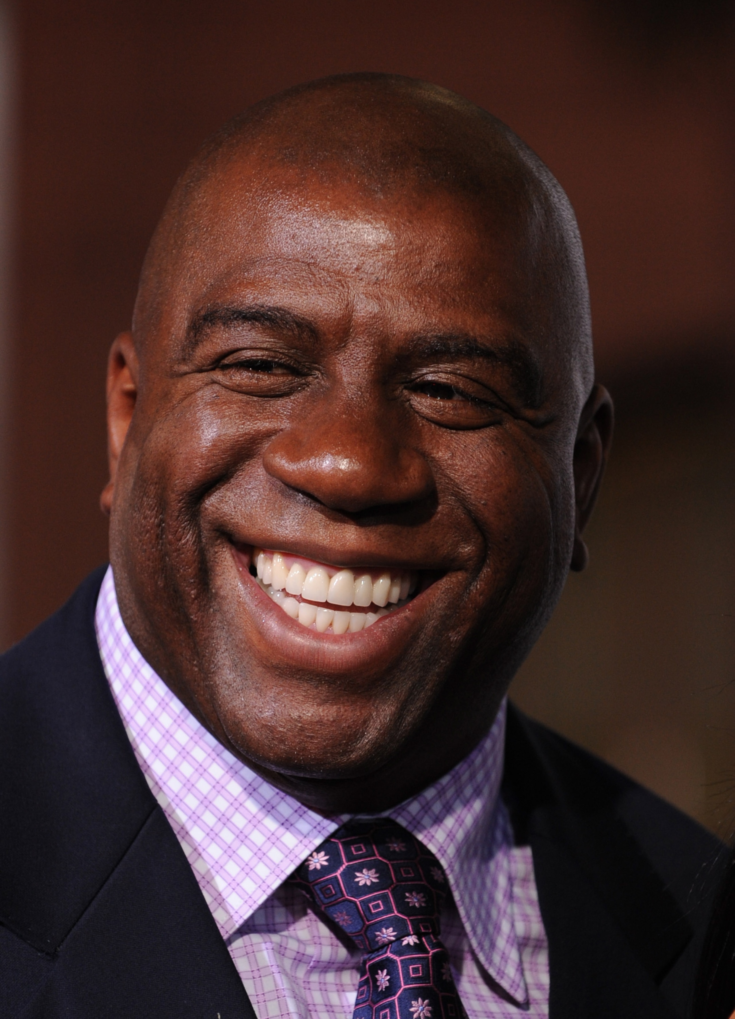 HOLLYWOOD - JANUARY 11: Former NBA player Earvin 'Magic' Johnson arrives at the Premiere Of Warner Bros. 'The Book Of Eli' at Grauman's Chinese Theater on January 11, 2010 in Hollywood, Los Angeles, California.  (Photo by Frazer Harrison/Getty Images)