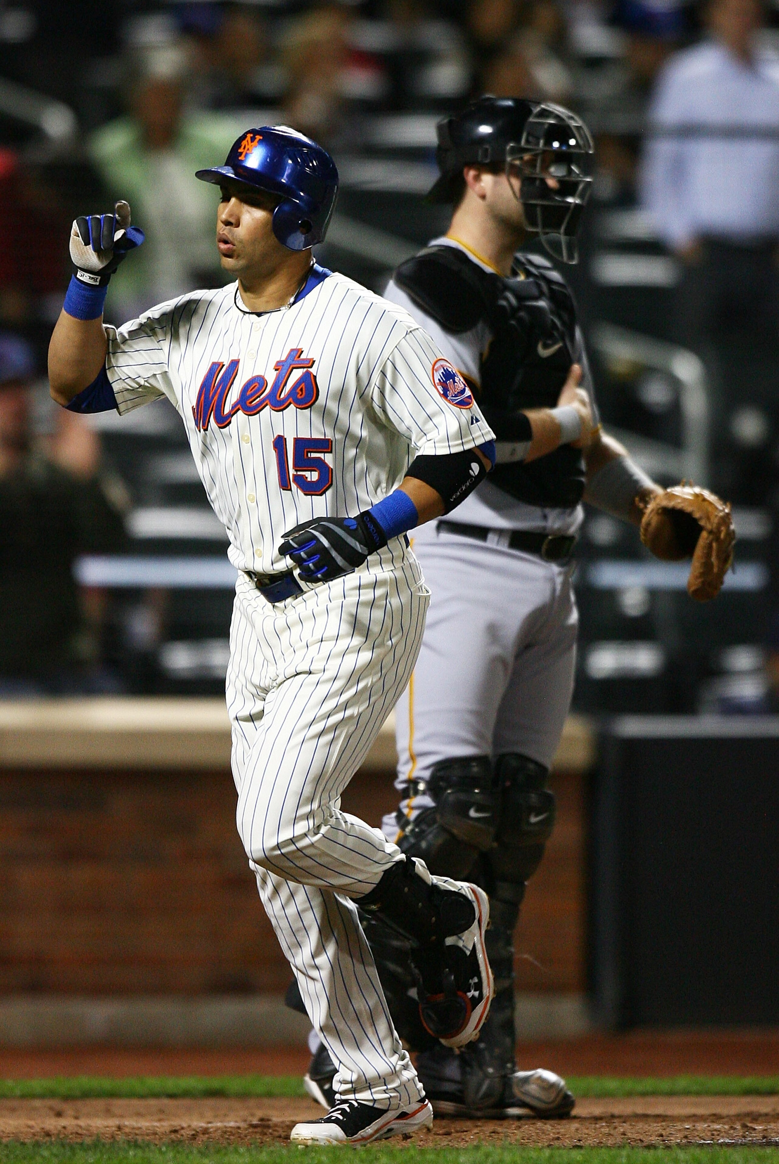 NEW YORK - SEPTEMBER 14: Carlos Beltran #15 of the New York Mets celebrates after hitting a home run in the third inning against the Pittsburgh Pirates on September 14, 2010 at Citi Field in the Flushing neighborhood of the Queens borough of New York Cit NEW YORK - SEPTEMBER 14: Carlos Beltran #15 of the New York Mets celebrates after hitting a home run in the third inning against the Pittsburgh Pirates on September 14, 2010 at Citi Field in the Flushing neighborhood of the Queens borough of New York Cit