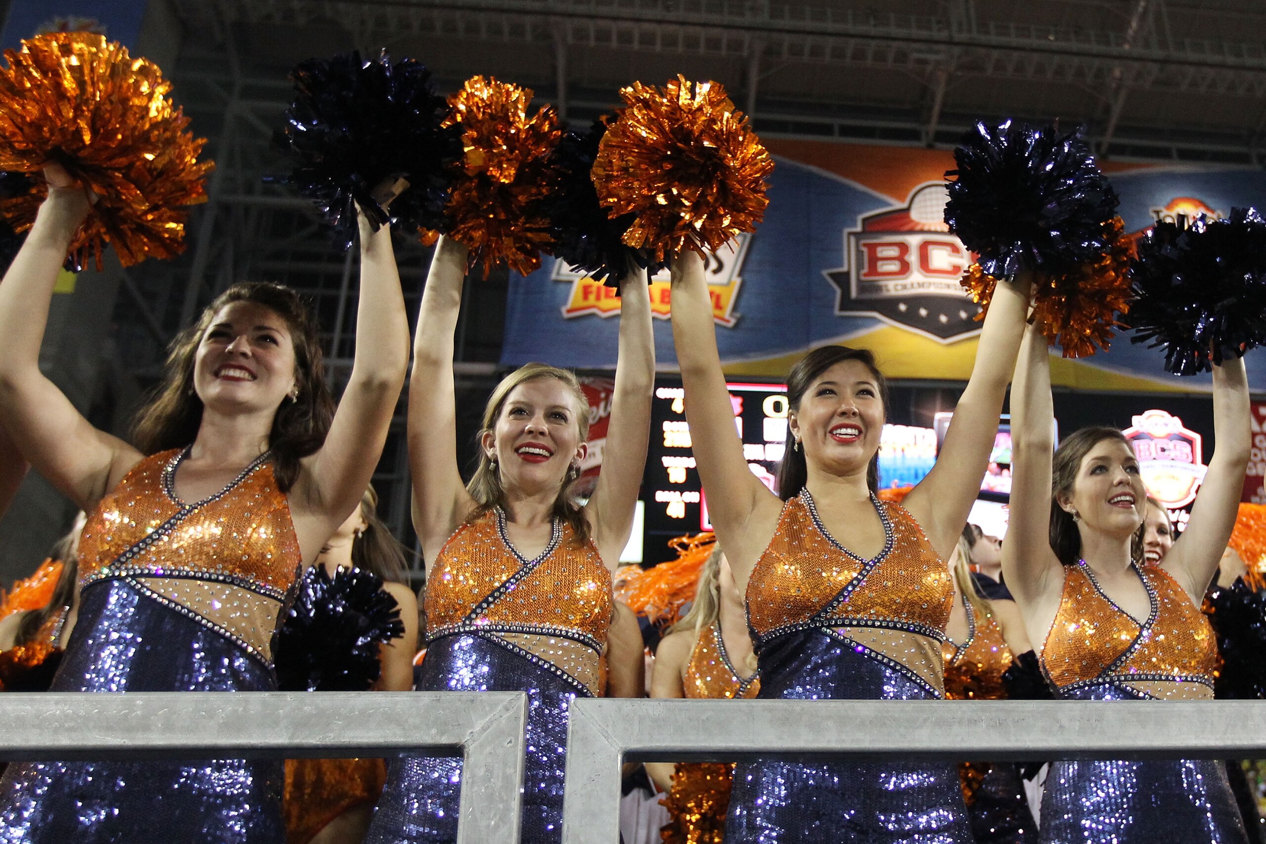 GLENDALE, AZ - JANUARY 10: Auburn Tigers cheerleaders perform during the Tostitos BCS National Championship Game against the Oregon Ducks at University of Phoenix Stadium on January 10, 2011 in Glendale, Arizona. (Photo by Christian Petersen/Getty Image GLENDALE, AZ - JANUARY 10: Auburn Tigers cheerleaders perform during the Tostitos BCS National Championship Game against the Oregon Ducks at University of Phoenix Stadium on January 10, 2011 in Glendale, Arizona. (Photo by Christian Petersen/Getty Image