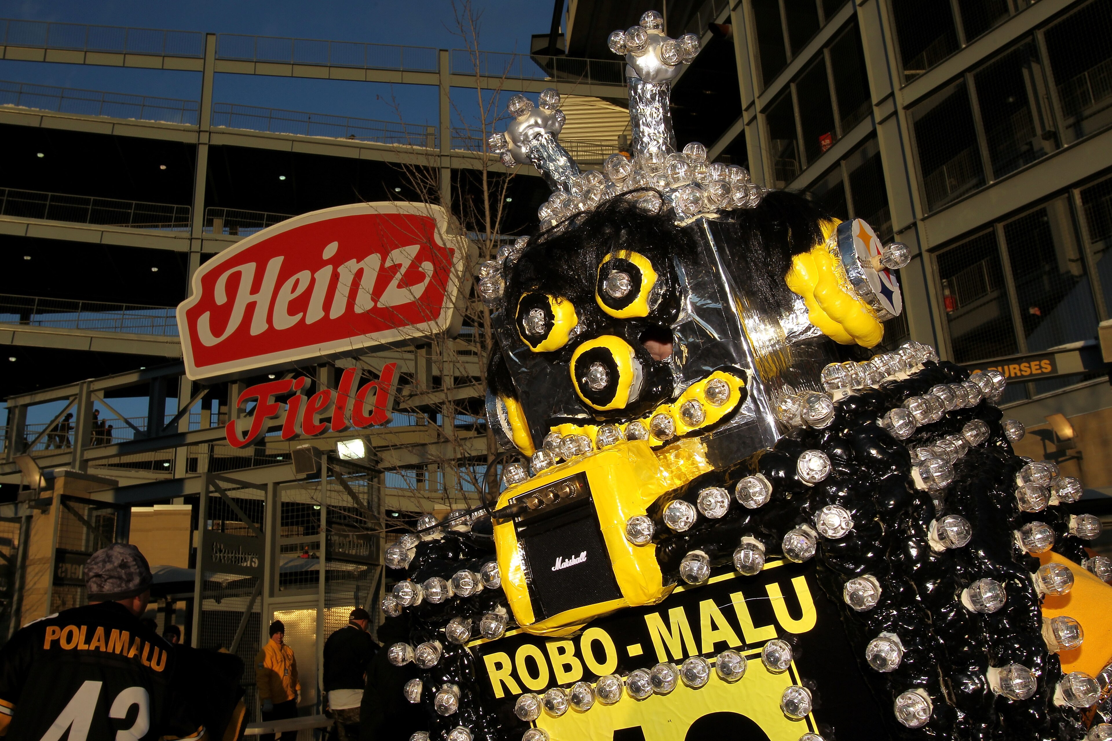 PITTSBURGH, PA - JANUARY 23: A fan dressed as Robo-Malu, inspired by Troy Polamalu #43 of the Pittsburgh Steelers, poses for a photo proir to the 2011 AFC Championship game between the New York Jets and the Pittsburgh Steelers at Heinz Field on January 2 PITTSBURGH, PA - JANUARY 23: A fan dressed as Robo-Malu, inspired by Troy Polamalu #43 of the Pittsburgh Steelers, poses for a photo proir to the 2011 AFC Championship game between the New York Jets and the Pittsburgh Steelers at Heinz Field on January 2