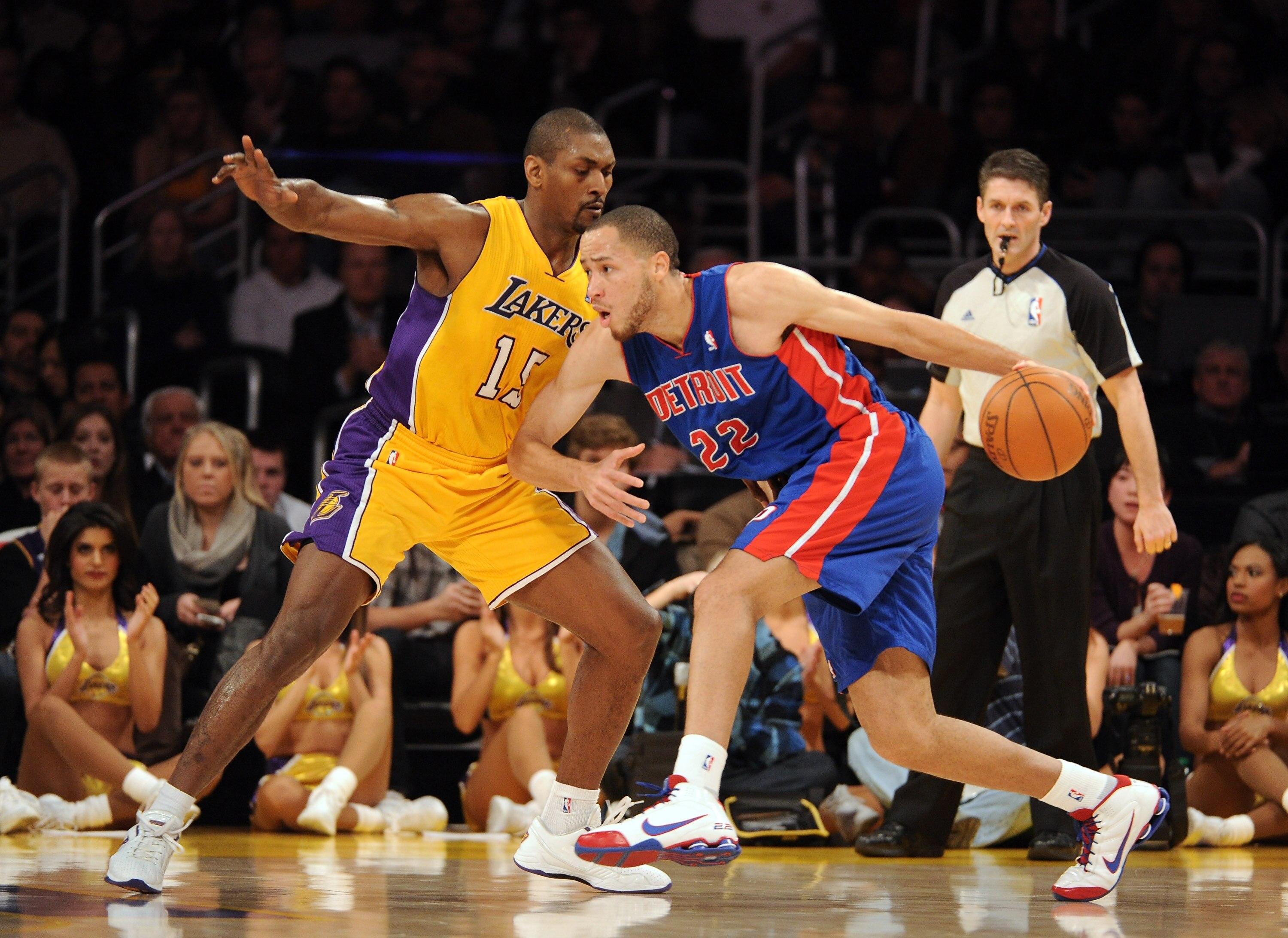 LOS ANGELES, CA - JANUARY 04:  Tayshaun Prince #22 of the Detroit Pistons dribbles in front of Ron Artest #15 of the Los Angeles Lakers during a 108-83 Laker win at the Staples Center on January 4, 2011 in Los Angeles, California. NOTE TO USER: User expre