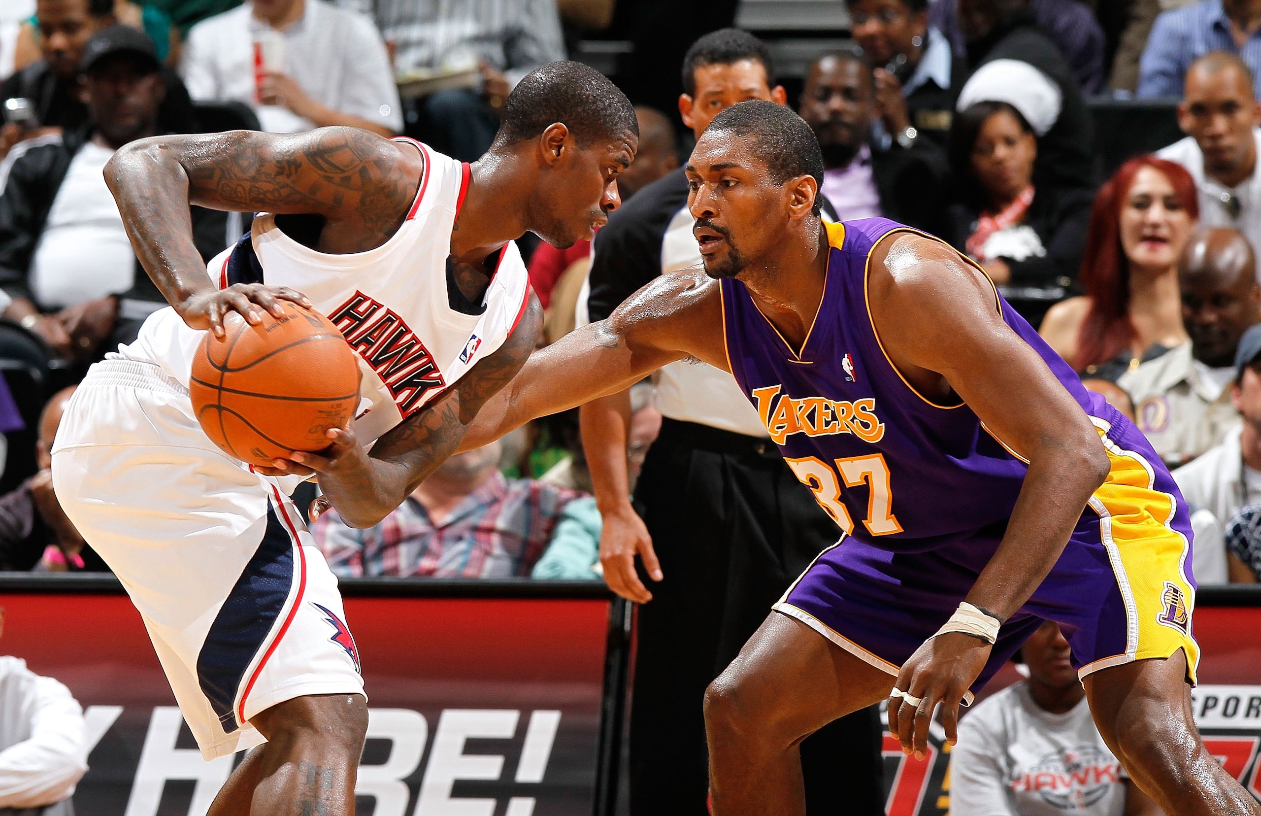 ATLANTA - MARCH 31:  Ron Artest #37 of the Los Angeles Lakers against Marvin Williams #24 of the Atlanta Hawks at Philips Arena on March 31, 2010 in Atlanta, Georgia.  NOTE TO USER: User expressly acknowledges and agrees that, by downloading and/or using