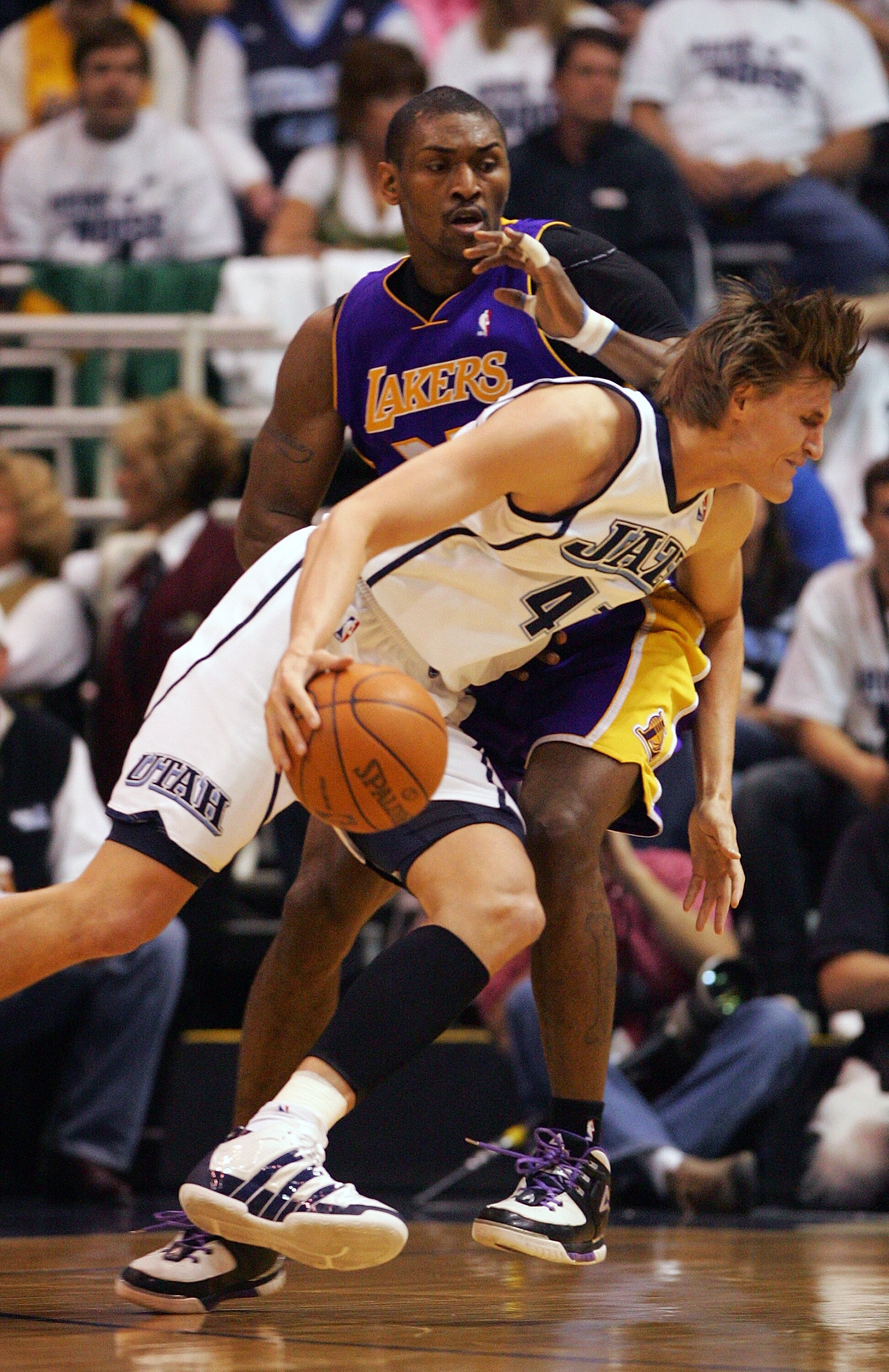 SALT LAKE CITY - MAY 08:  Andrei Kirilenko #47 of the Utah Jazz drives by Ron Artest #37 of the Los Angeles Lakers during Game Three of the Western Conference Semifinals of the 2010 NBA Playoffs on May 8, 2010 at energy Solutions Arena in Salt Lake City,