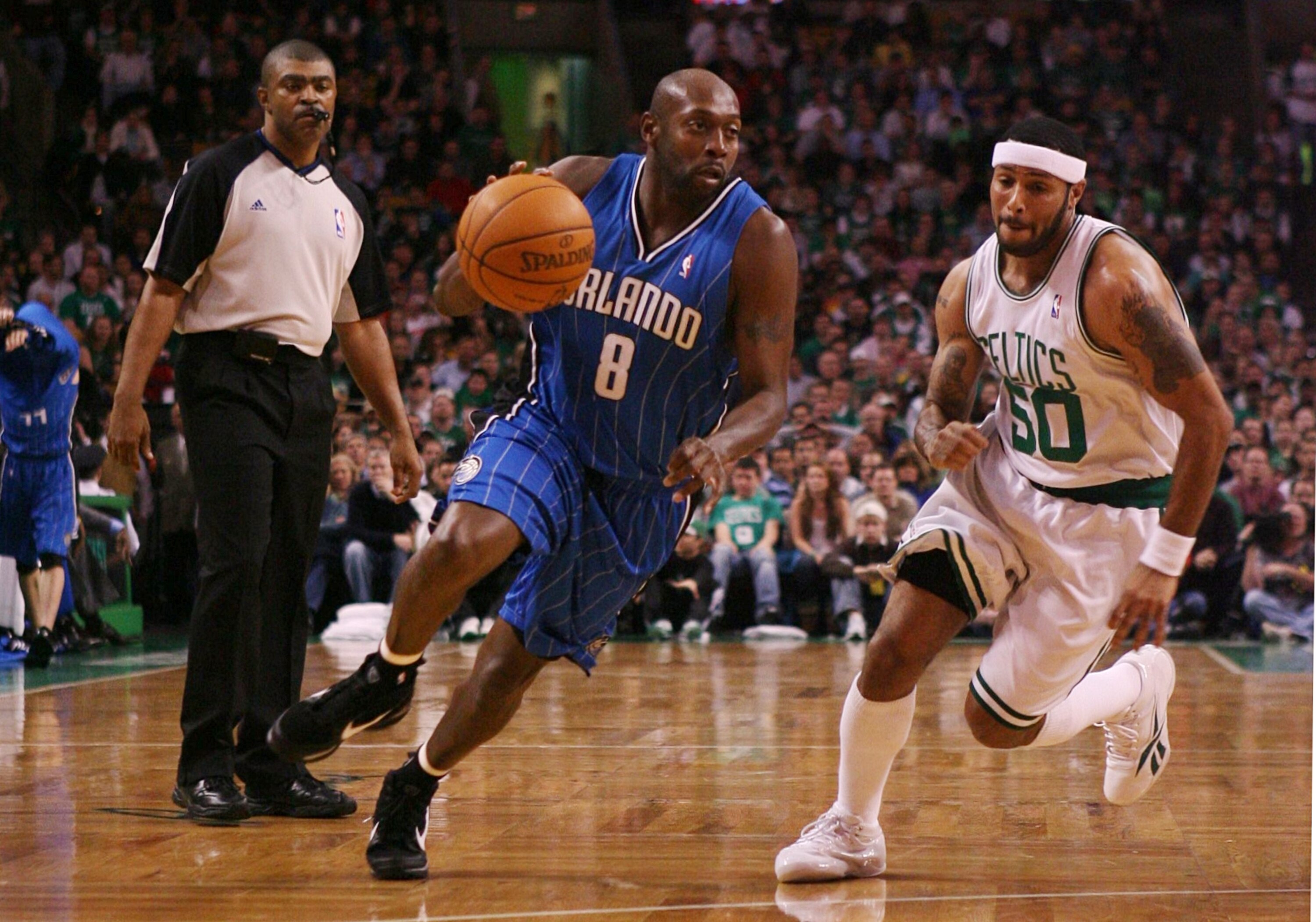 BOSTON - NOVEMBER 20: Anthony Johnson #8 of the Orlando Magic drives the ball up court against Eddie House #50 of the Boston Celtics during the game on November 20, 2009 at the TD Garden in Boston, Massachusetts. NOTE TO USER: User expressly acknowledges