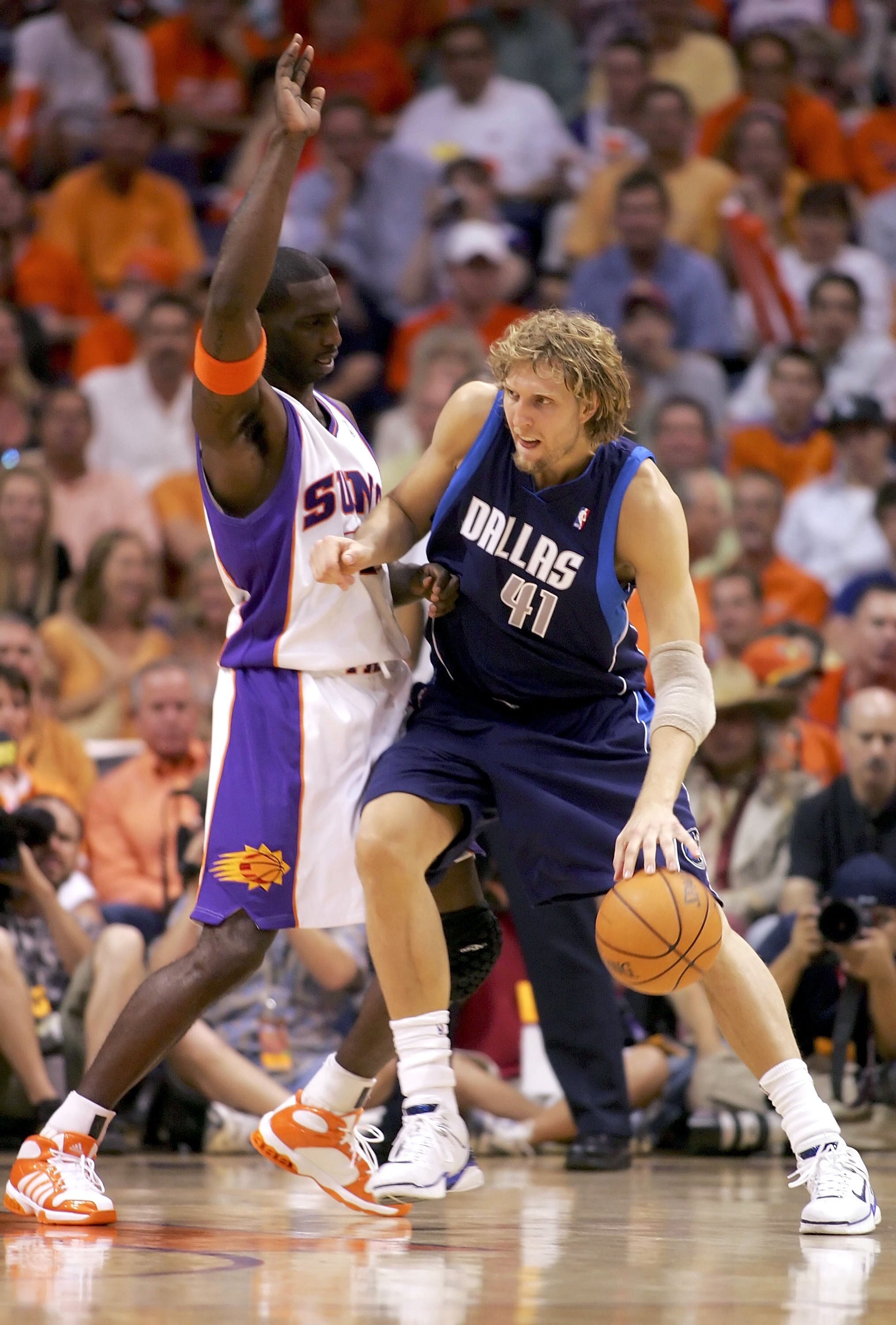 PHOENIX - MAY 30:  Dirk Nowitzki #41 of the Dallas Mavericks goes up against Tim Thomas #2 of the Phoenix Suns in game four of the Western Conference Finals during the 2006 NBA Playoffs on May 30, 2006 at US Airways Center in Phoenix, Arizona.  NOTE TO US