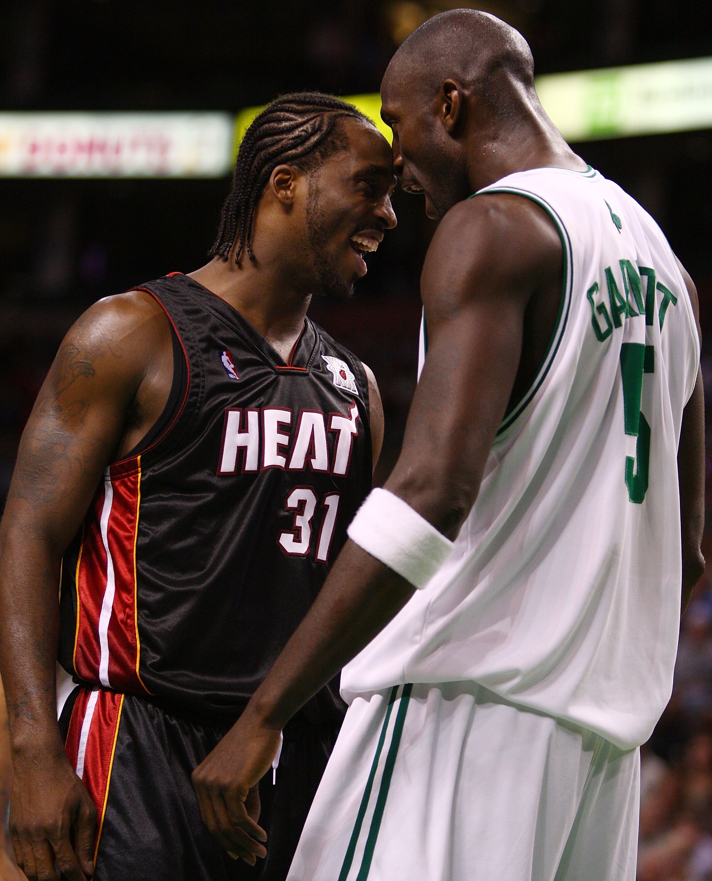 BOSTON - NOVEMBER 16:Kevin Garnett #5 of the Boston Celtics celebrates after he is fouled by Shaquille O'Neal as Ricky Davis #31 of the Miami Heat joins in on the fun on November 16, 2007 at the TD Banknorth Garden in Boston, Massachusetts. NOTE TO USER: