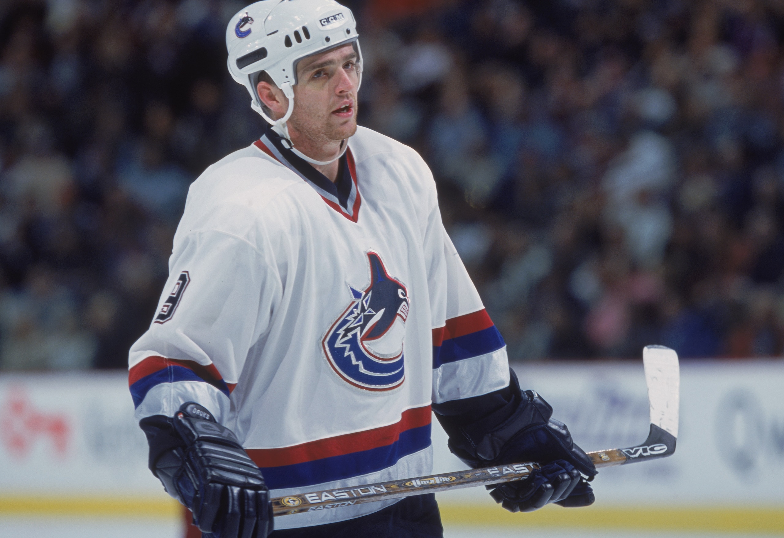 25 Oct 2001:  Left Winger Harold Druken #9 of the Vancouver Canucks standing on the ice looking on during the game against the Colorado Avalanche at the Pepsi Center in Denver, Colorado. The Avalanche defeated the Canucks 4-1.Mandatory Credit: Brian Bahr