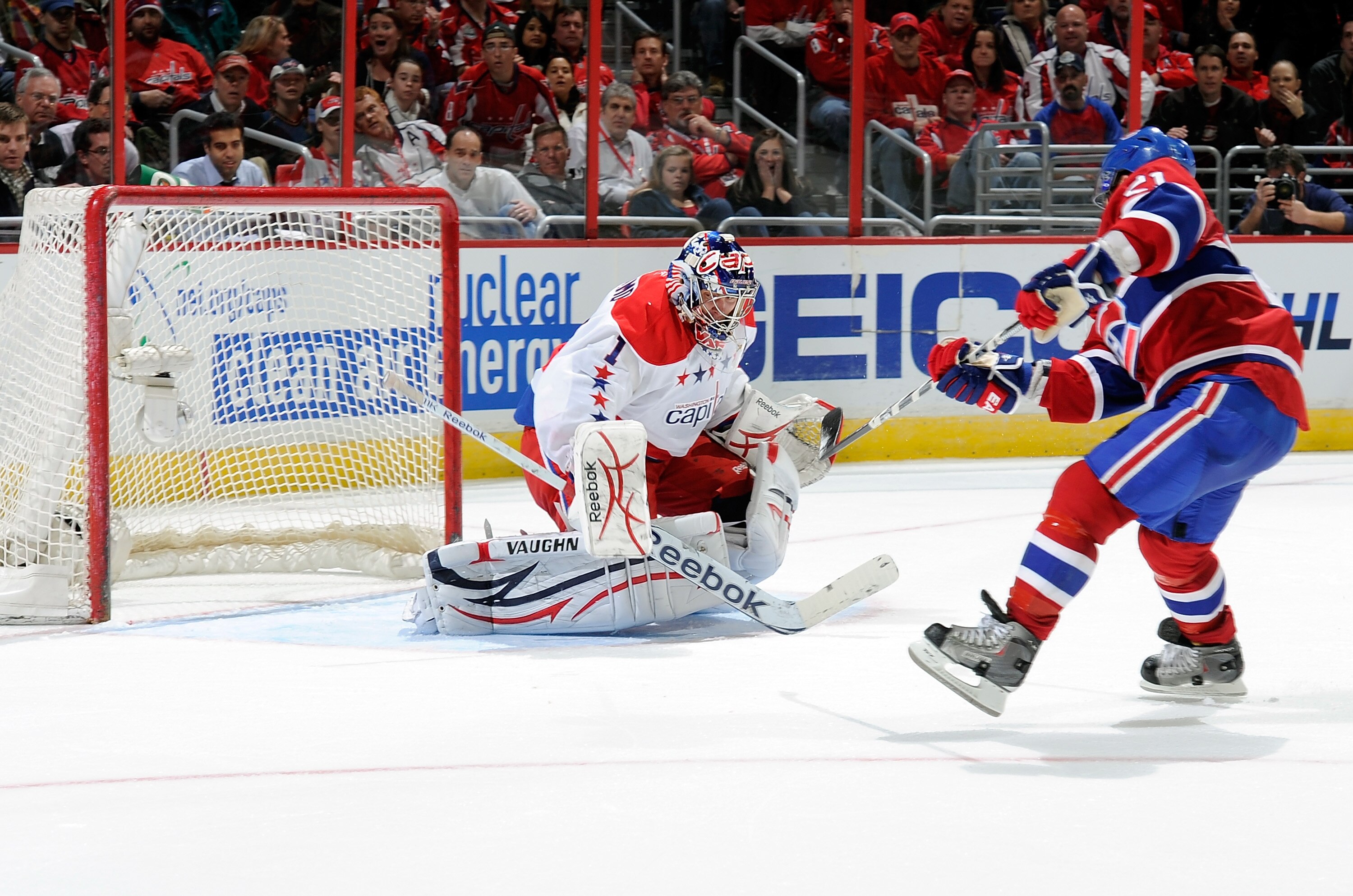 WASHINGTON, DC - FEBRUARY 01:  Brian Gionta #21 of the Montreal Canadiens scores in the second period against Semyon Varlamov #1 of the Washington Capitals at the Verizon Center on February 1, 2011 in Washington, DC.  (Photo by Greg Fiume/Getty Images)