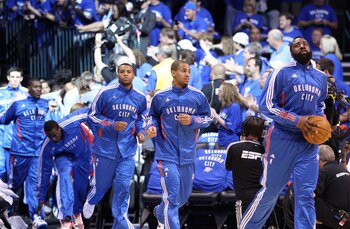 OKLAHOMA CITY, OK - MAY 23:  (R-L) James Harden #13, Eric Maynor #6 and Daequan Cook #14 run out of the tunnel before taking on the Dallas Mavericks in Game Four of the Western Conference Finals during the 2011 NBA Playoffs at Oklahoma City Arena on May 2