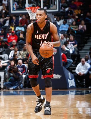 ATLANTA - NOVEMBER 18:  Daequan Cook #14 of the Miami Heat against the Atlanta Hawks at Philips Arena on November 18, 2009 in Atlanta, Georgia.  (Photo by Kevin C. Cox/Getty Images)