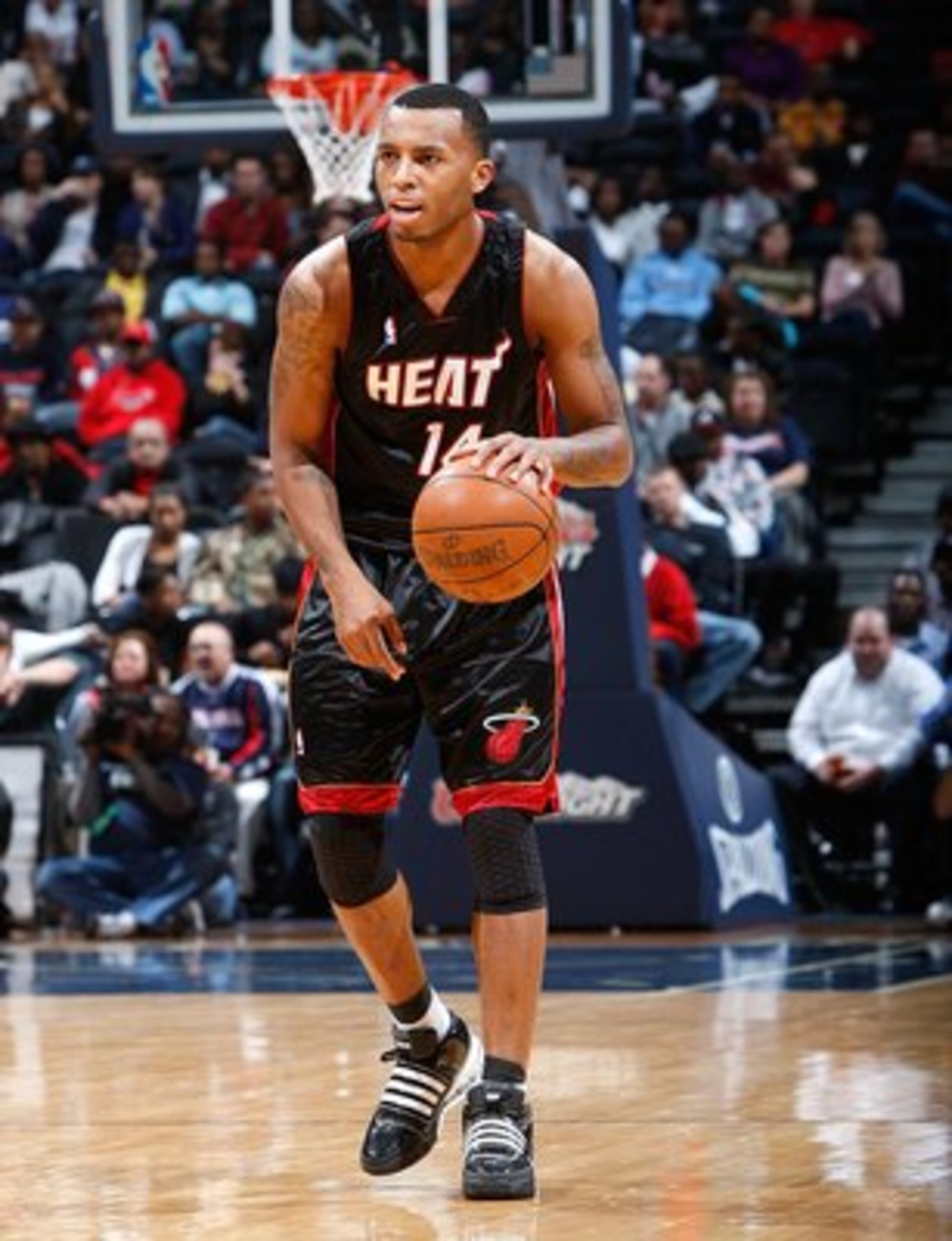 ATLANTA - NOVEMBER 18:  Daequan Cook #14 of the Miami Heat against the Atlanta Hawks at Philips Arena on November 18, 2009 in Atlanta, Georgia.  (Photo by Kevin C. Cox/Getty Images)