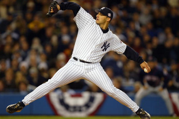 BRONX, NY - OCTOBER 2:  Starting pitcher Andy Pettitte #46 of the New York Yankees delivers in the first inning against the Minnesota Twins during game two of the American League Division Series at Yankee Stadium on October 2, 2003 in the Bronx, New York.