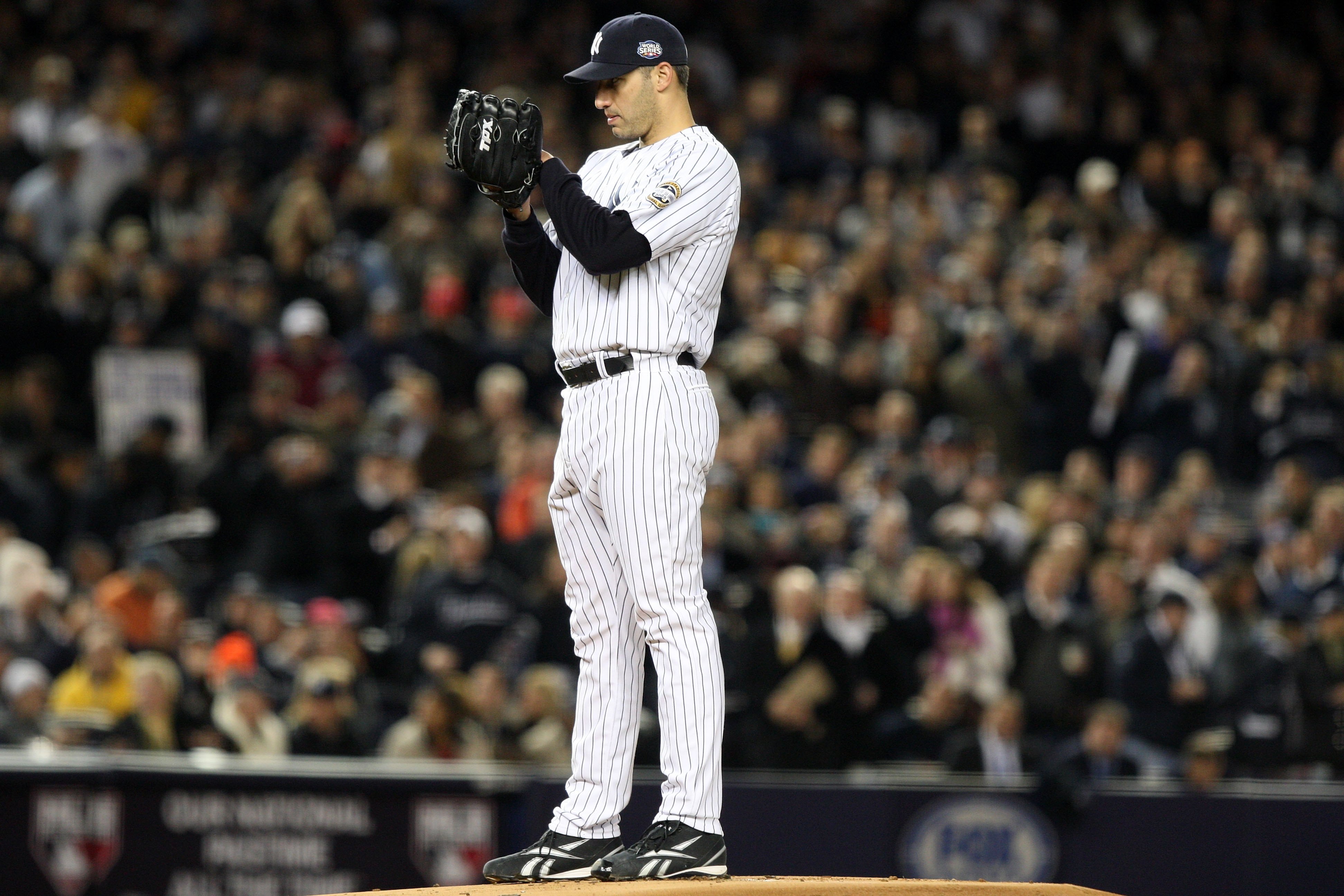 NEW YORK - NOVEMBER 04:  Starting pitcher Andy Pettitte #46 of the New York Yankees gets set to throw a pitch against the Philadelphia Phillies in Game Six of the 2009 MLB World Series at Yankee Stadium on November 4, 2009 in the Bronx borough of New York