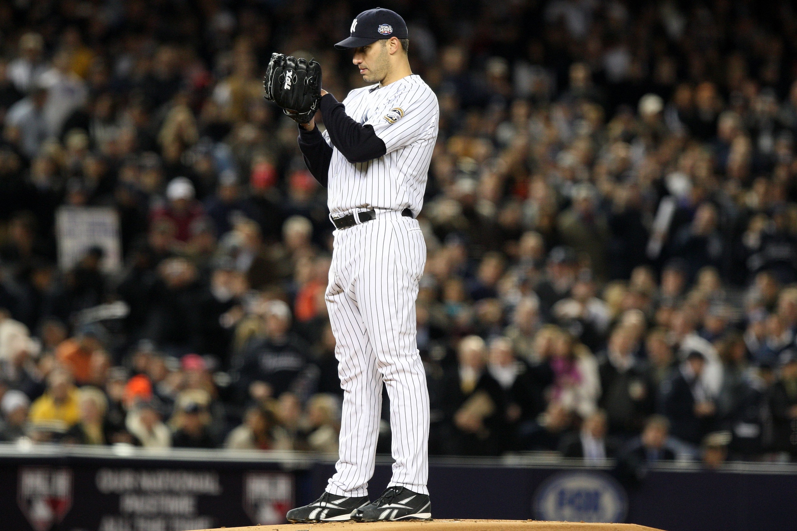 NEW YORK - NOVEMBER 04:  Starting pitcher Andy Pettitte #46 of the New York Yankees gets set to throw a pitch against the Philadelphia Phillies in Game Six of the 2009 MLB World Series at Yankee Stadium on November 4, 2009 in the Bronx borough of New York