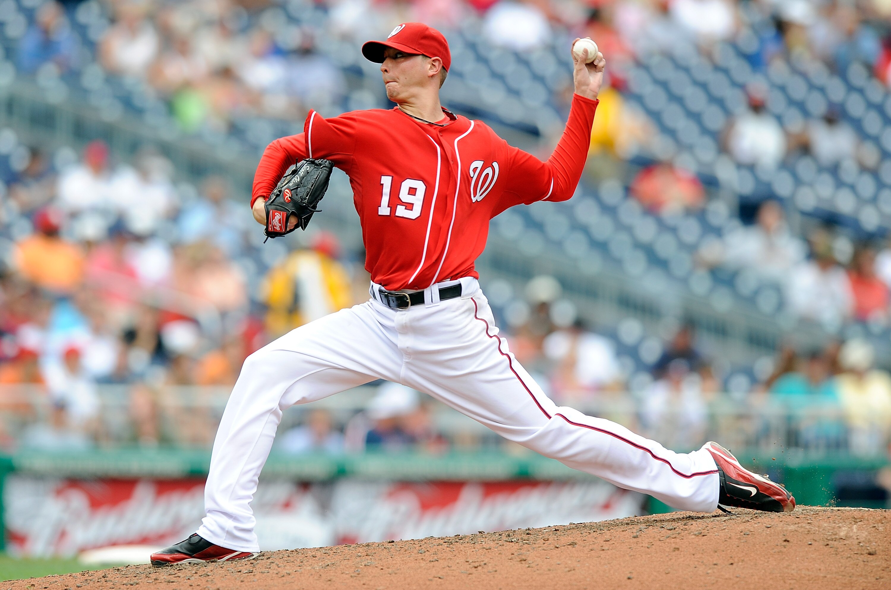 WASHINGTON - JULY 29:  Scott Olsen #19 of the Washington Nationals pitches against the Atlanta Braves at Nationals Park on July 29, 2010 in Washington, DC.  (Photo by Greg Fiume/Getty Images)