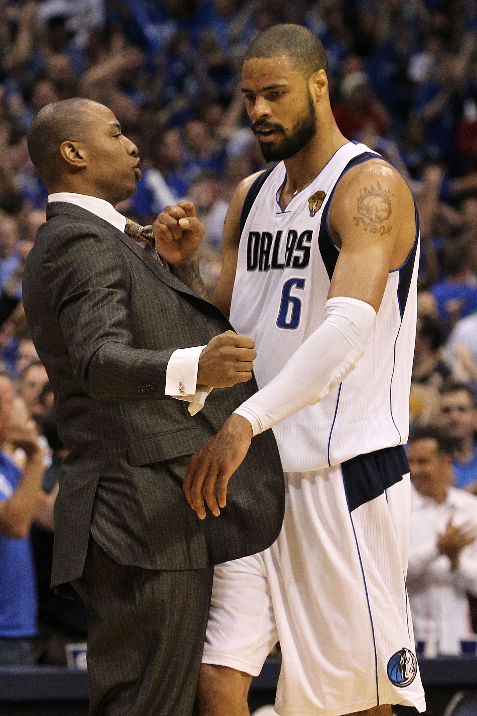 DALLAS, TX - JUNE 09: Caron Butler and Tyson Chandler #6 of the Dallas Mavericks celebrate against the Miami Heat in the fourth quarter of Game Five of the 2011 NBA Finals at American Airlines Center on June 9, 2011 in Dallas, Texas.  NOTE TO USER: User e