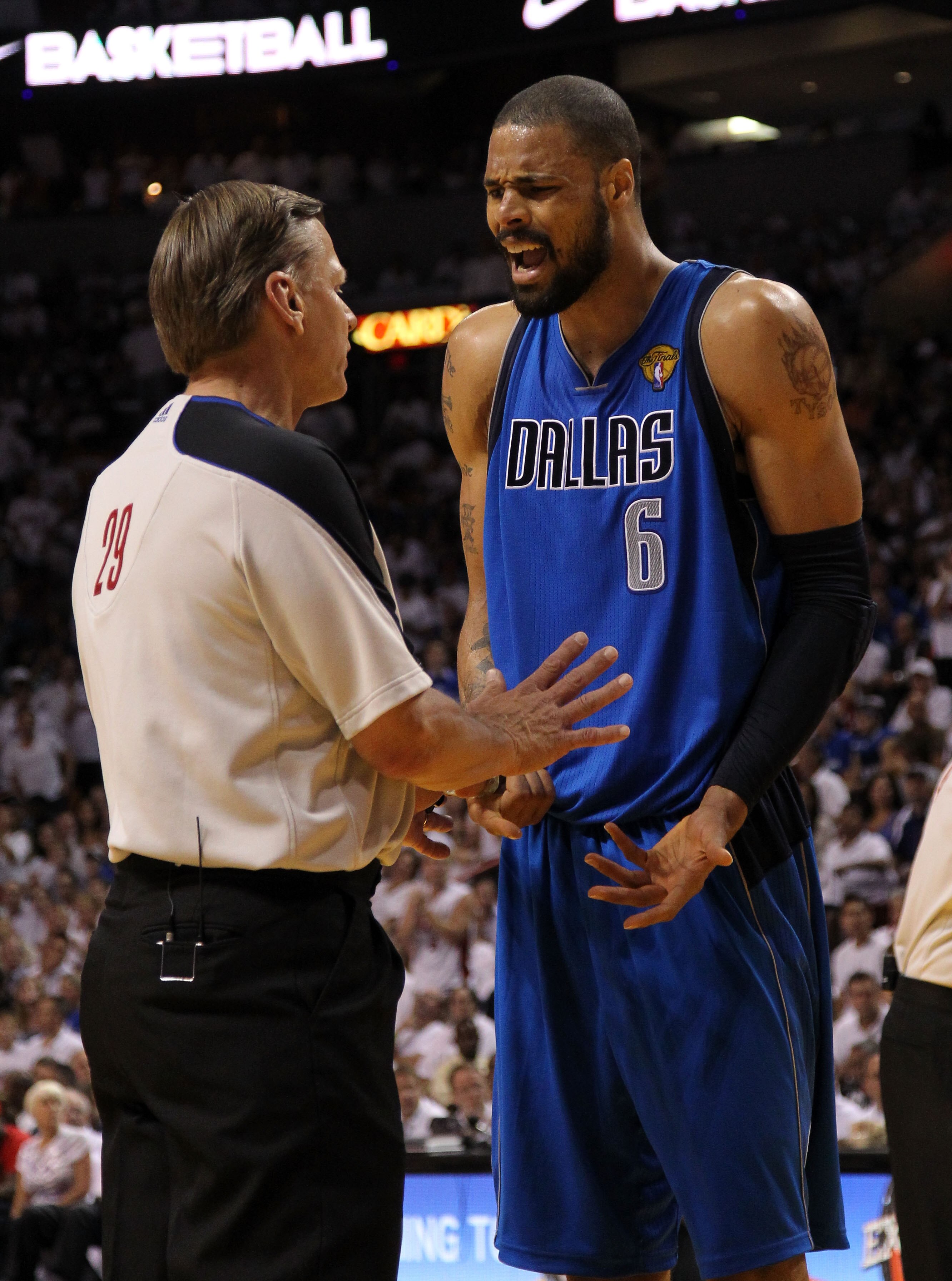 MIAMI, FL - JUNE 12:  Tyson Chandler #6 of the Dallas Mavericks argues a call with referee Steve Javie #29 against the Miami Heat in the first half of Game Six of the 2011 NBA Finals at American Airlines Arena on June 12, 2011 in Miami, Florida. NOTE TO U