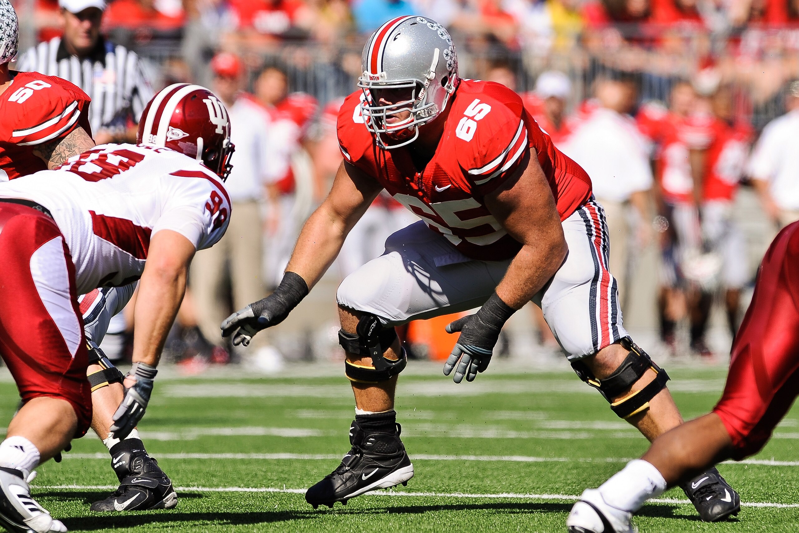 COLUMBUS, OH - OCTOBER 9:  Justin Boren #65 of the Ohio State Buckeyes blocks against the Indiana Hoosiers at Ohio Stadium on October 9, 2010 in Columbus, Ohio.  (Photo by Jamie Sabau/Getty Images)