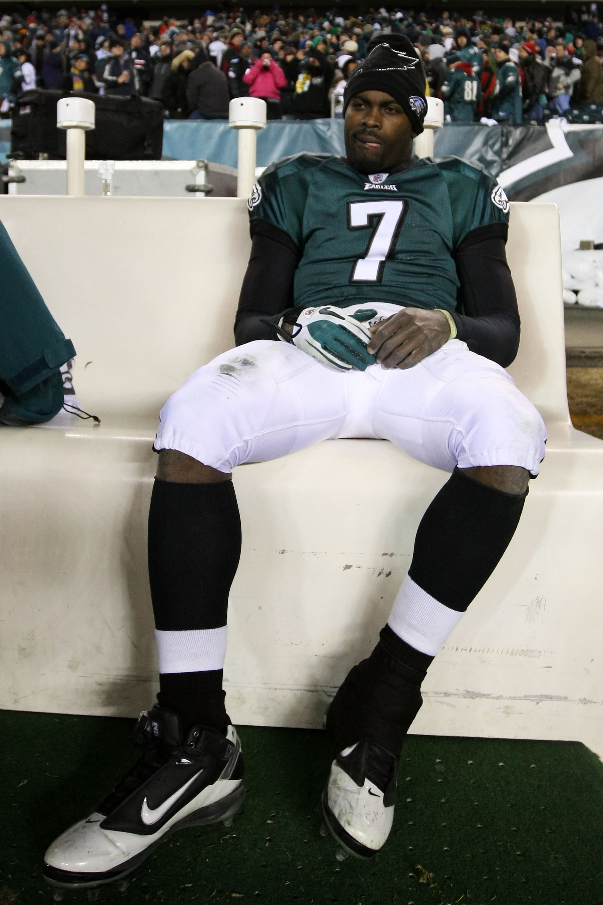 PHILADELPHIA, PA - JANUARY 09:  Michael Vick #7 of the Philadelphia Eagles sits on the bench after losing to the Green Bay Packers during the 2011 NFC wild card playoff game at Lincoln Financial Field on January 9, 2011 in Philadelphia, Pennsylvania.  (Ph