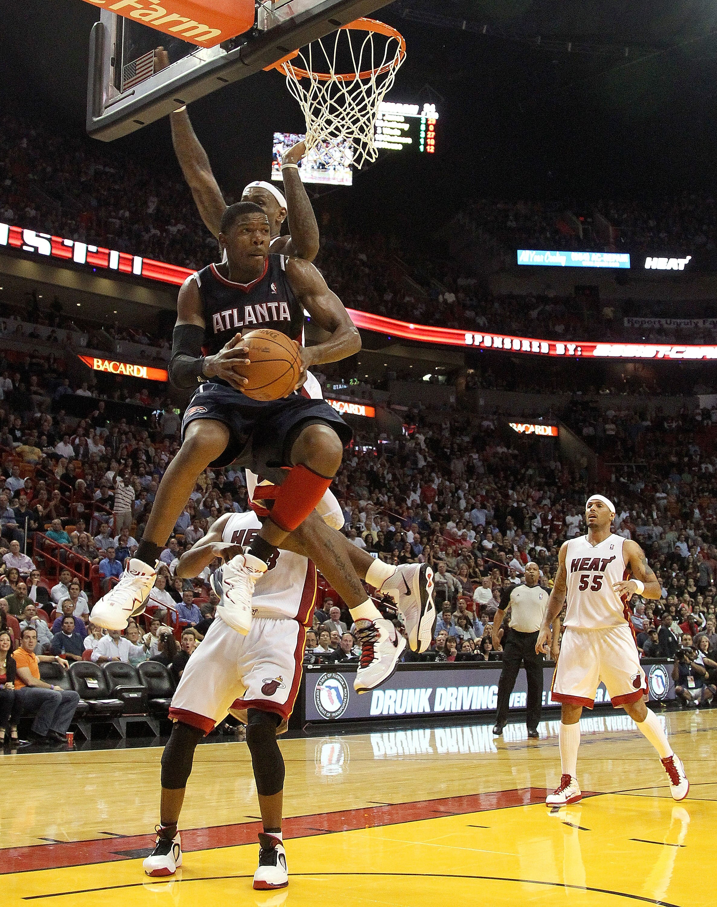 MIAMI, FL - JANUARY 18: Joe Johnson #2 of the Atlanta Hawks passes out of traffic during a game against the Miami Heat at American Airlines Arena on January 18, 2011 in Miami, Florida. NOTE TO USER: User expressly acknowledges and agrees that, by downloa MIAMI, FL - JANUARY 18: Joe Johnson #2 of the Atlanta Hawks passes out of traffic during a game against the Miami Heat at American Airlines Arena on January 18, 2011 in Miami, Florida. NOTE TO USER: User expressly acknowledges and agrees that, by downloa