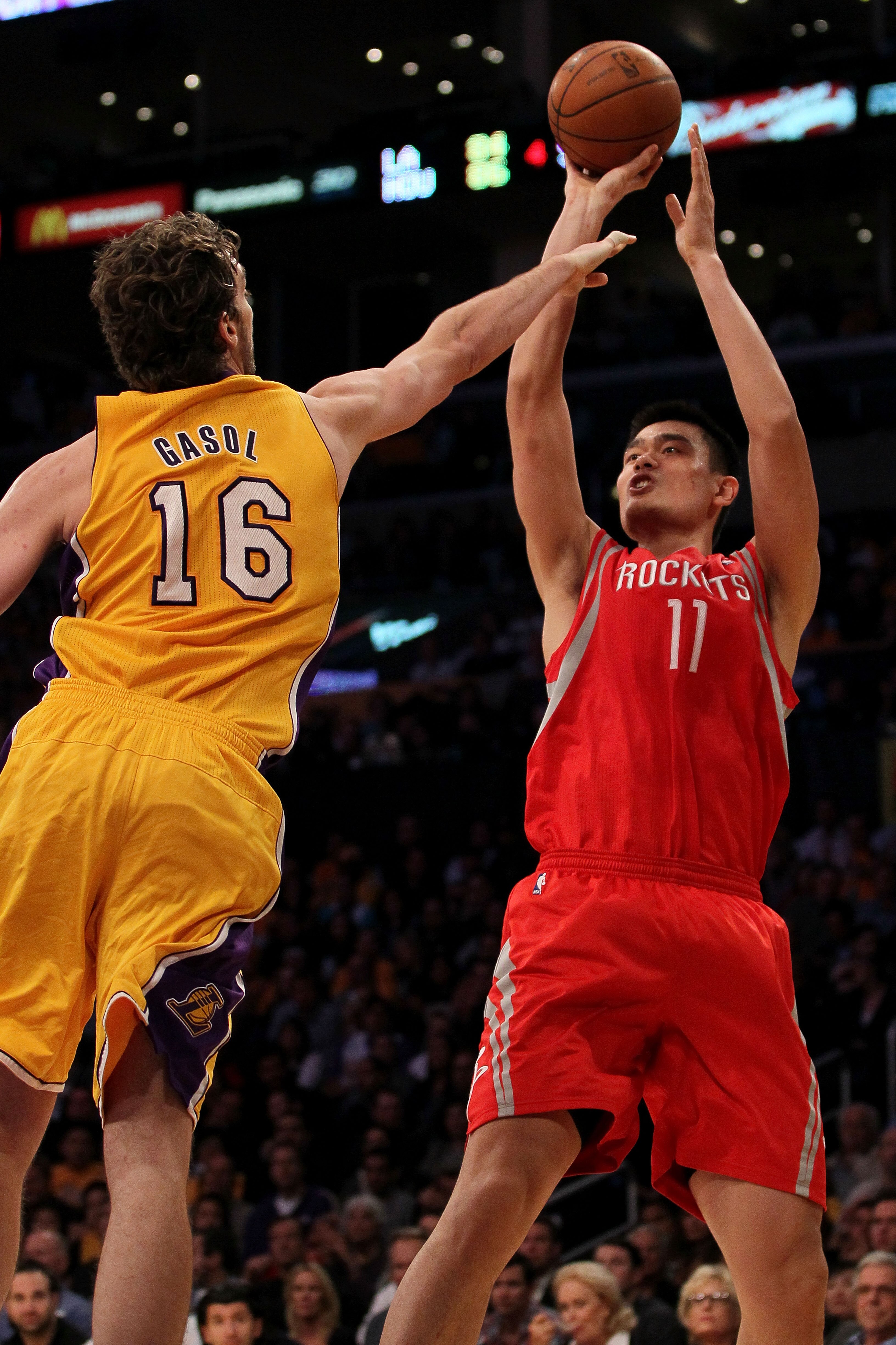 LOS ANGELES, CA - OCTOBER 26: Yao Ming #11 of the Houston Rockets takes a shot against the Los Angeles Lakers during their game at Staples Center on October 26, 2010 in Los Angeles, California. NOTE TO USER: User expressly acknowledges and agrees that, b LOS ANGELES, CA - OCTOBER 26: Yao Ming #11 of the Houston Rockets takes a shot against the Los Angeles Lakers during their game at Staples Center on October 26, 2010 in Los Angeles, California. NOTE TO USER: User expressly acknowledges and agrees that, b