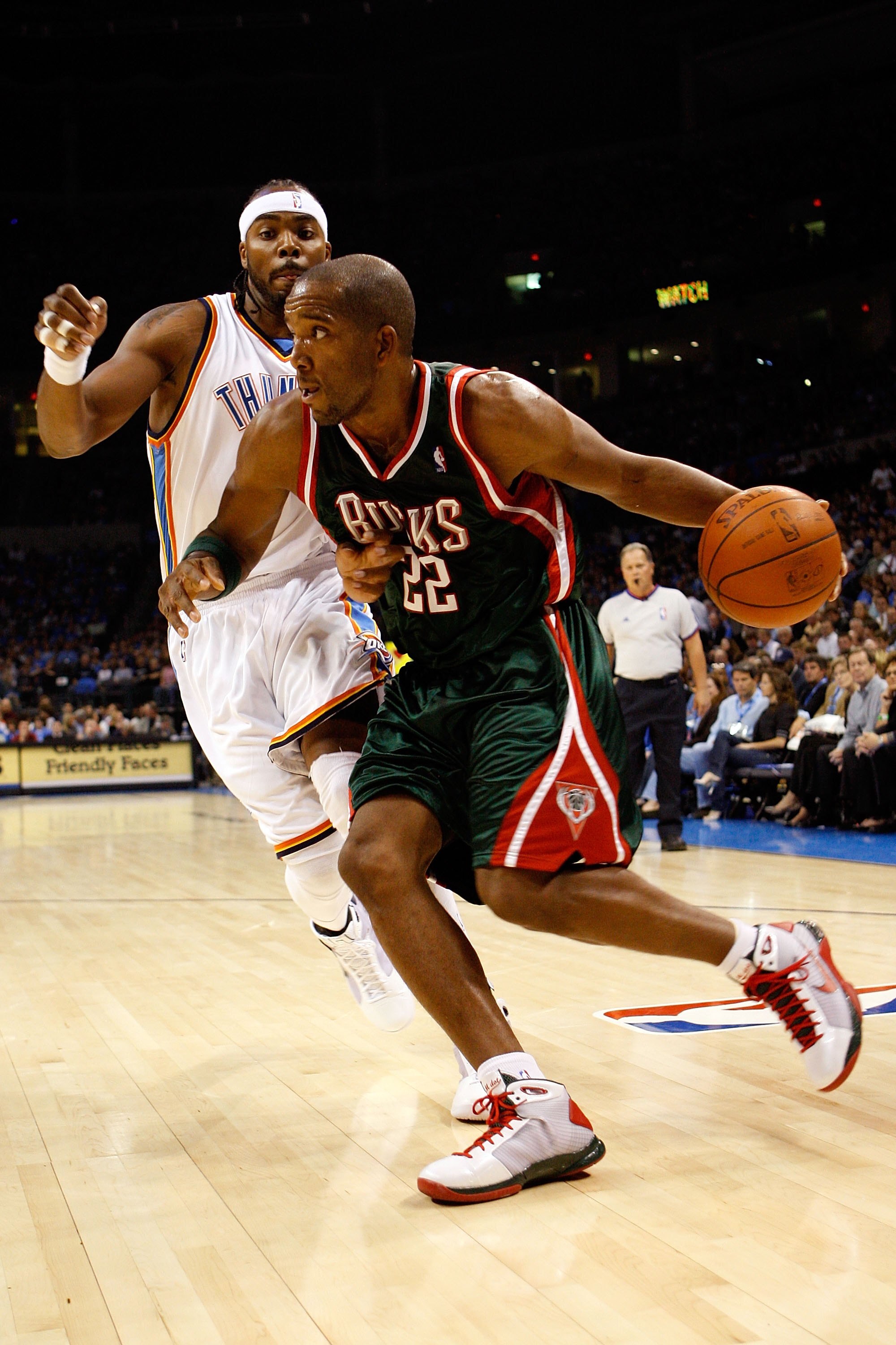 OKLAHOMA CITY - OCTOBER 29: Michael Redd #22 of the Milwaukee Bucks drives to the basket past Chris Wilcox #54 of the Oklahoma City Thunder at the Ford Center on October 29, 2008 in Oklahoma City, Oklahoma. The Bucks won 98-87. NOTE TO USER: User expres OKLAHOMA CITY - OCTOBER 29: Michael Redd #22 of the Milwaukee Bucks drives to the basket past Chris Wilcox #54 of the Oklahoma City Thunder at the Ford Center on October 29, 2008 in Oklahoma City, Oklahoma. The Bucks won 98-87. NOTE TO USER: User expres