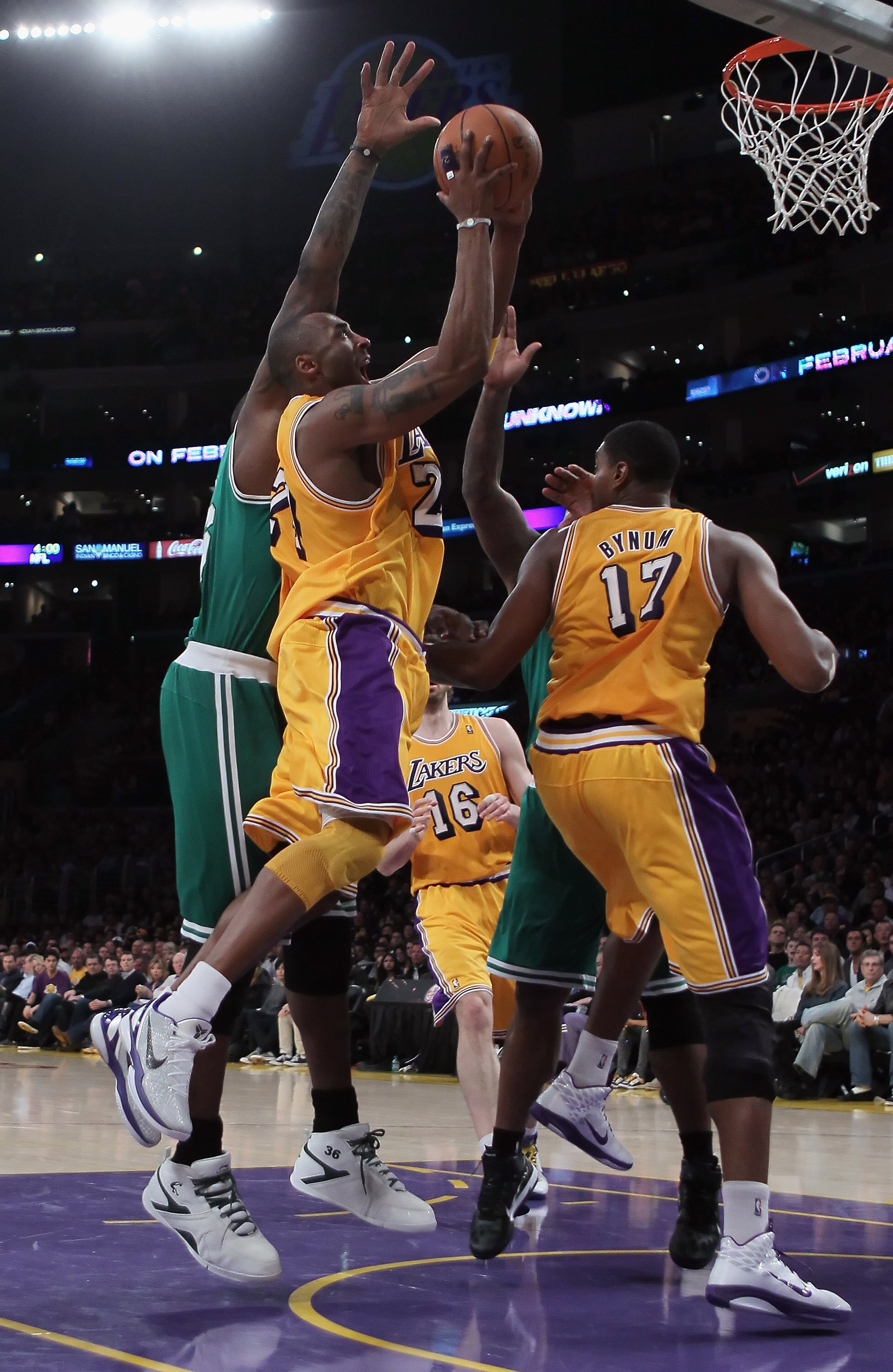 LOS ANGELES, CA - JANUARY 30: Kobe Bryant #24 of the Los Angeles Lakers drives to the basket over teammate Andrew Bynum #17 against the Boston Celtics in the second half at Staples Center on January 30, 2011 in Los Angeles, California. The Celtics defeat LOS ANGELES, CA - JANUARY 30: Kobe Bryant #24 of the Los Angeles Lakers drives to the basket over teammate Andrew Bynum #17 against the Boston Celtics in the second half at Staples Center on January 30, 2011 in Los Angeles, California. The Celtics defeat