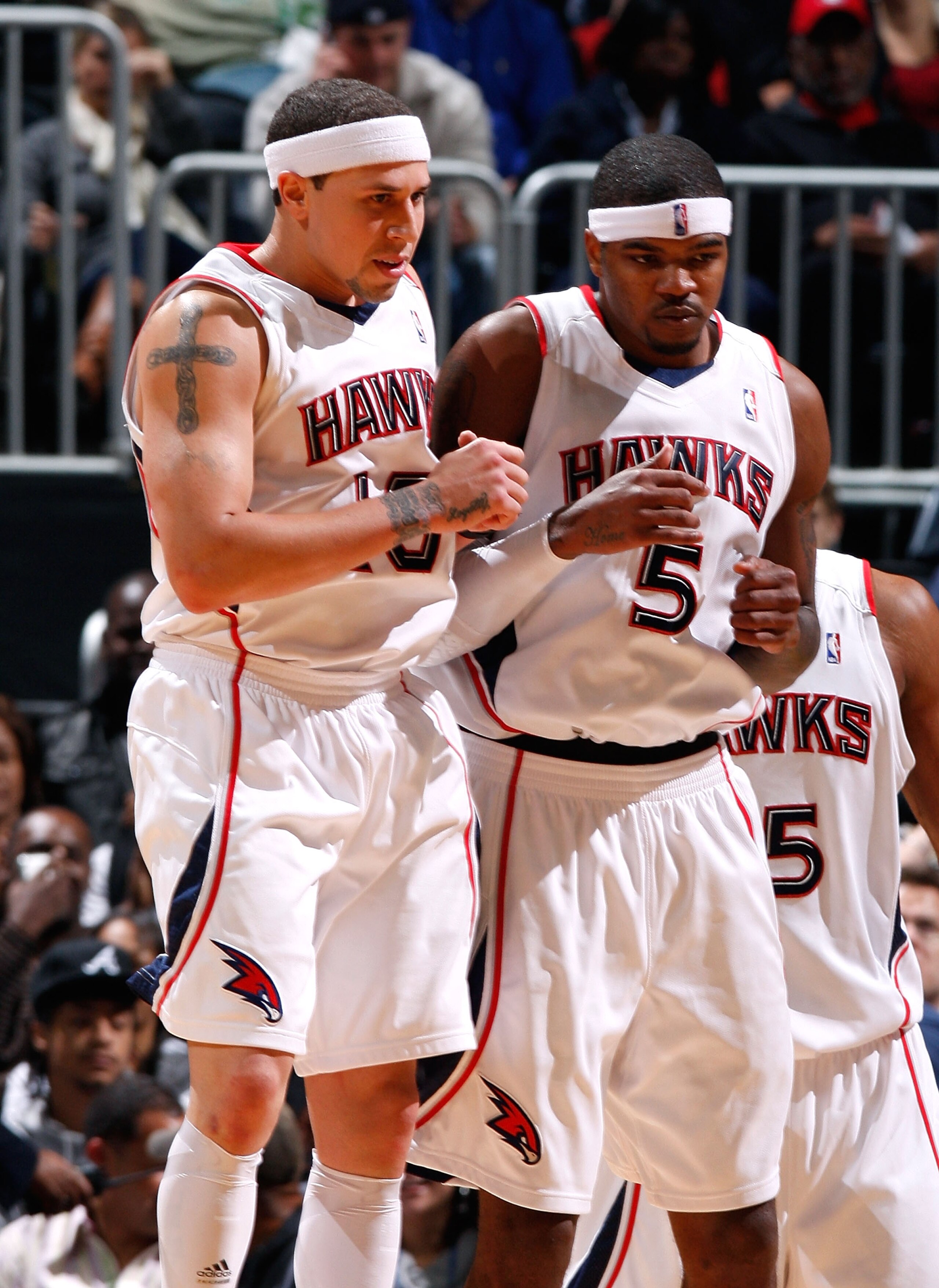 ATLANTA - NOVEMBER 18:  Mike Bibby #10 and Josh Smith #5 of the Atlanta Hawks celebrate a basket against the Miami Heat at Philips Arena on November 18, 2009 in Atlanta, Georgia.  (Photo by Kevin C. Cox/Getty Images)