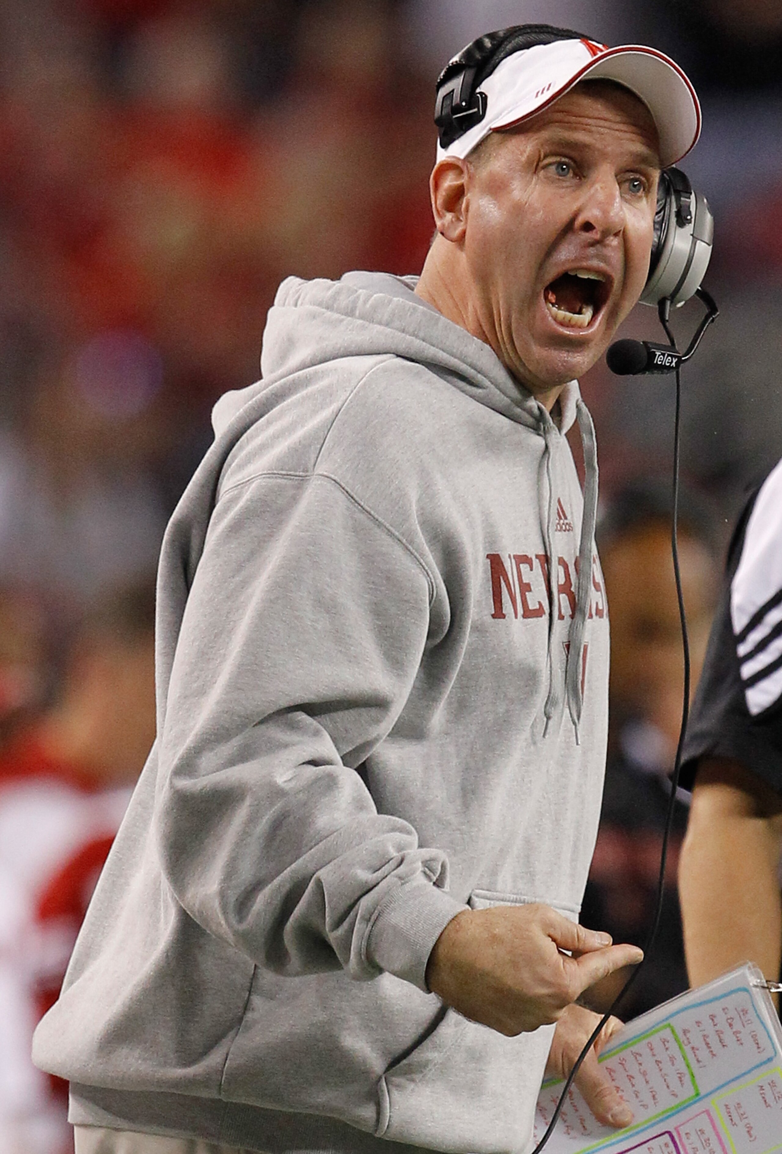 ARLINGTON, TX - DECEMBER 04:  Head coach Bo Pelini of the Nebraska Cornhuskers leads his team against the Oklahoma Sooners at Cowboys Stadium on December 4, 2010 in Arlington, Texas. The Sooners beat the Cornhuskers 23-20.  (Photo by Tom Pennington/Getty