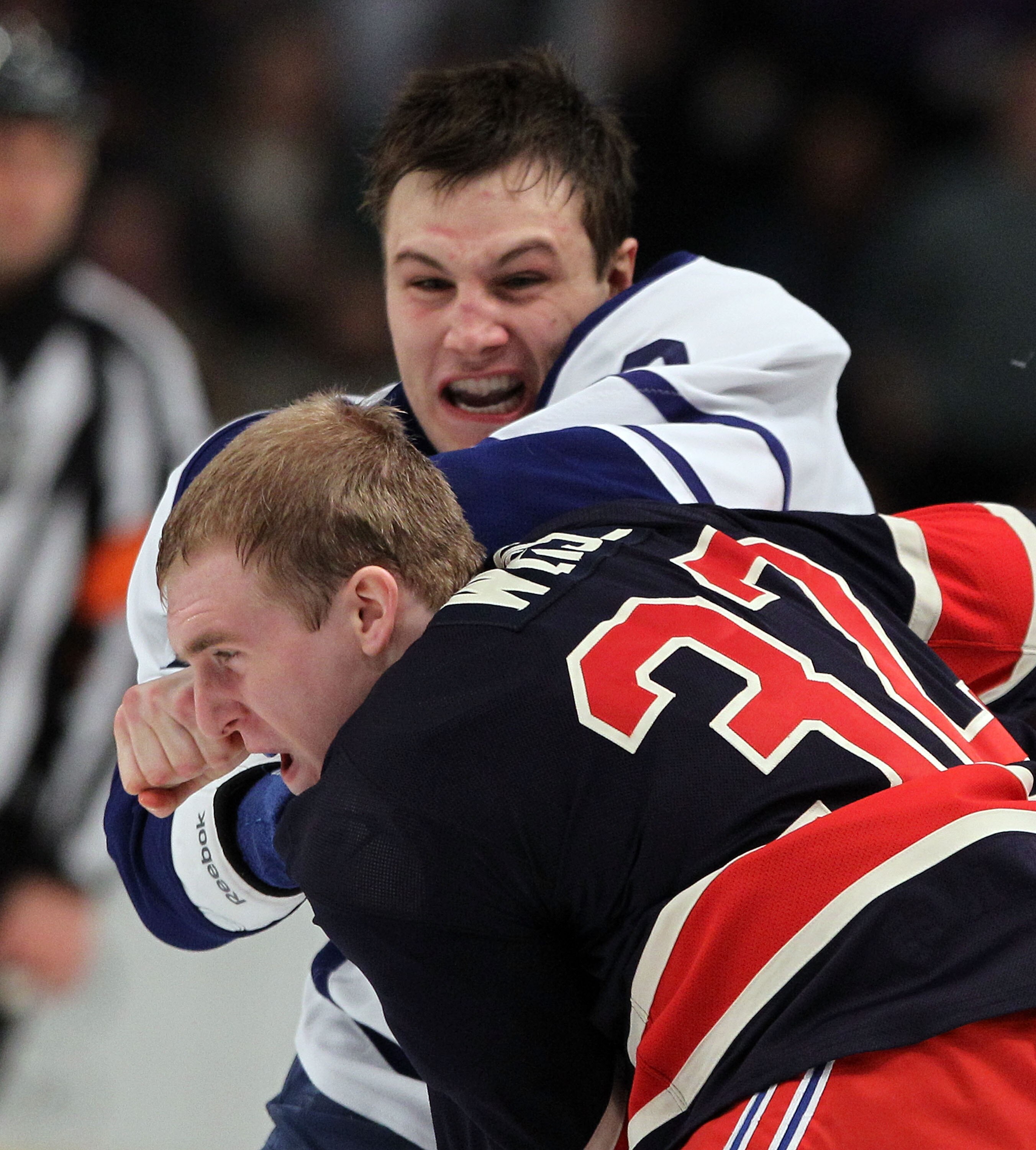 NEW YORK, NY - JANUARY 19:  Luke Schenn #2 of the Toronto Maplea Leafs and Dale Weise #32 of the New York Rangers fight during the second period at Madison Square Garden on January 19, 2011 in New York City.  (Photo by Bruce Bennett/Getty Images)