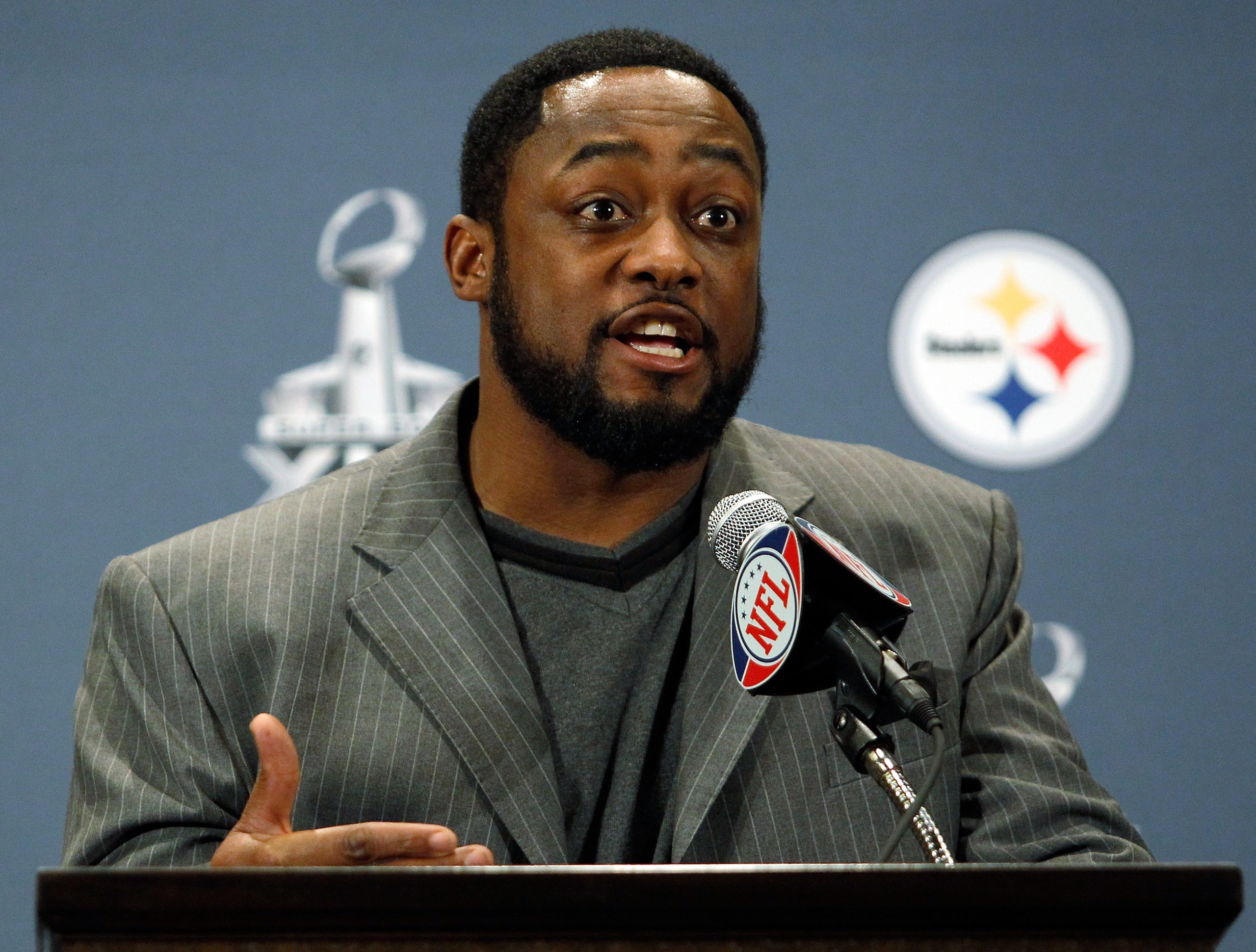 FORT WORTH, TX - JANUARY 31:  Head coach Mike Tomlin of the Pittsburgh Steelers talks with the media after arriving at the Omni Fort Worth Hotel on January 31, 2011 in Fort Worth, Texas. The Pittsburgh Steelers will play the Green Bay Packers in Super Bow