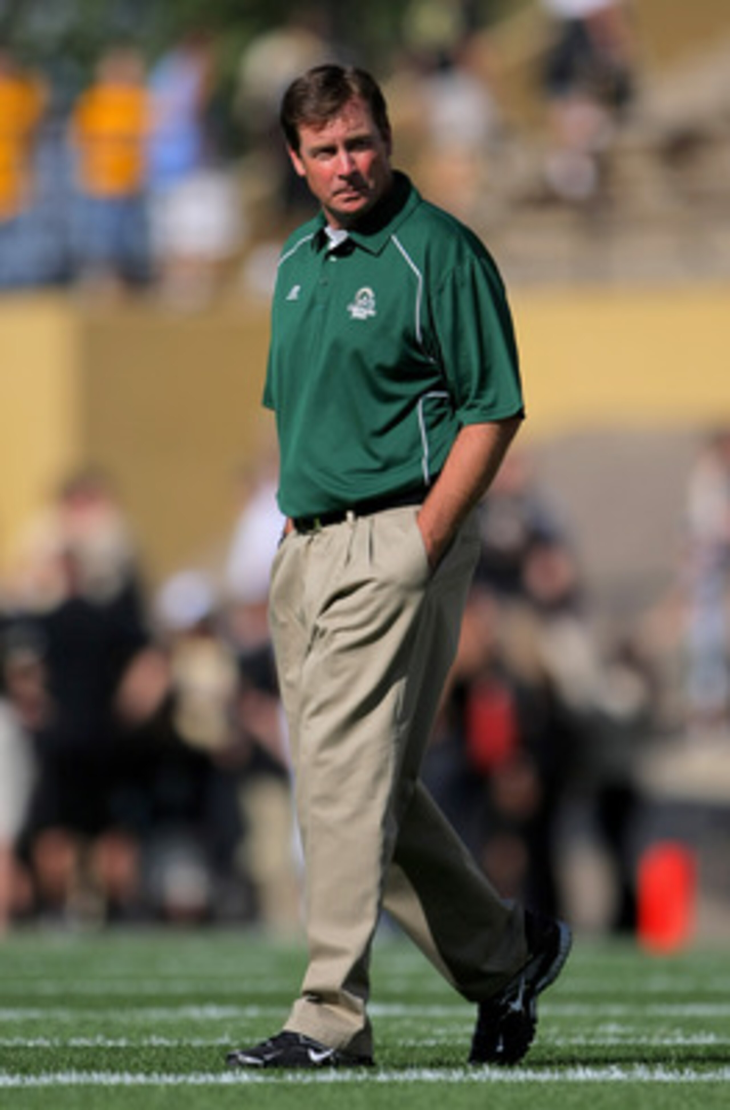 BOULDER, CO - SEPTEMBER 06:  Head coach Steve Fairchild of the Colorado State Rams walks the field during warm ups prior to facing the Colorado Buffaloes at Folsom Field on September 6, 2009 in Boulder, Colorado.  (Photo by Doug Pensinger/Getty Images)
