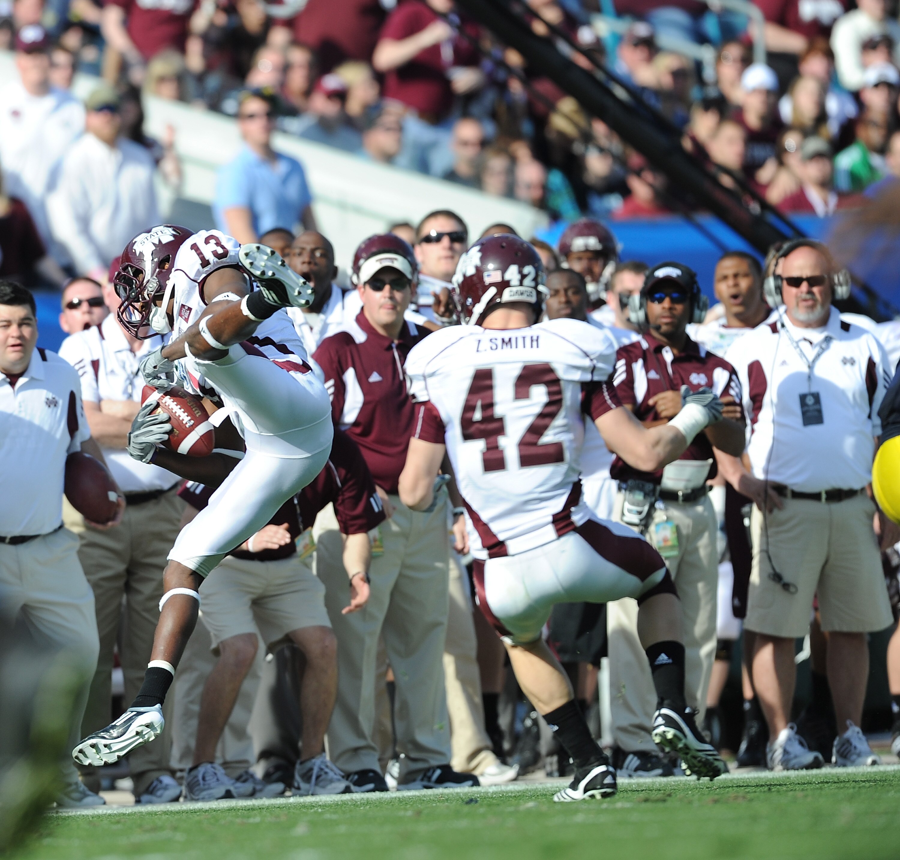 JACKSONVILLE, FL - JANUARY 01:  Cornerbank Johnthan Banks #13 of the Mississippi State Bulldogs intercepts a pass against the Michigan Wolverines during the Gator Bowl at EverBank Field on January 1, 2011 in Jacksonville, Florida  (Photo by Rick Dole/Gett