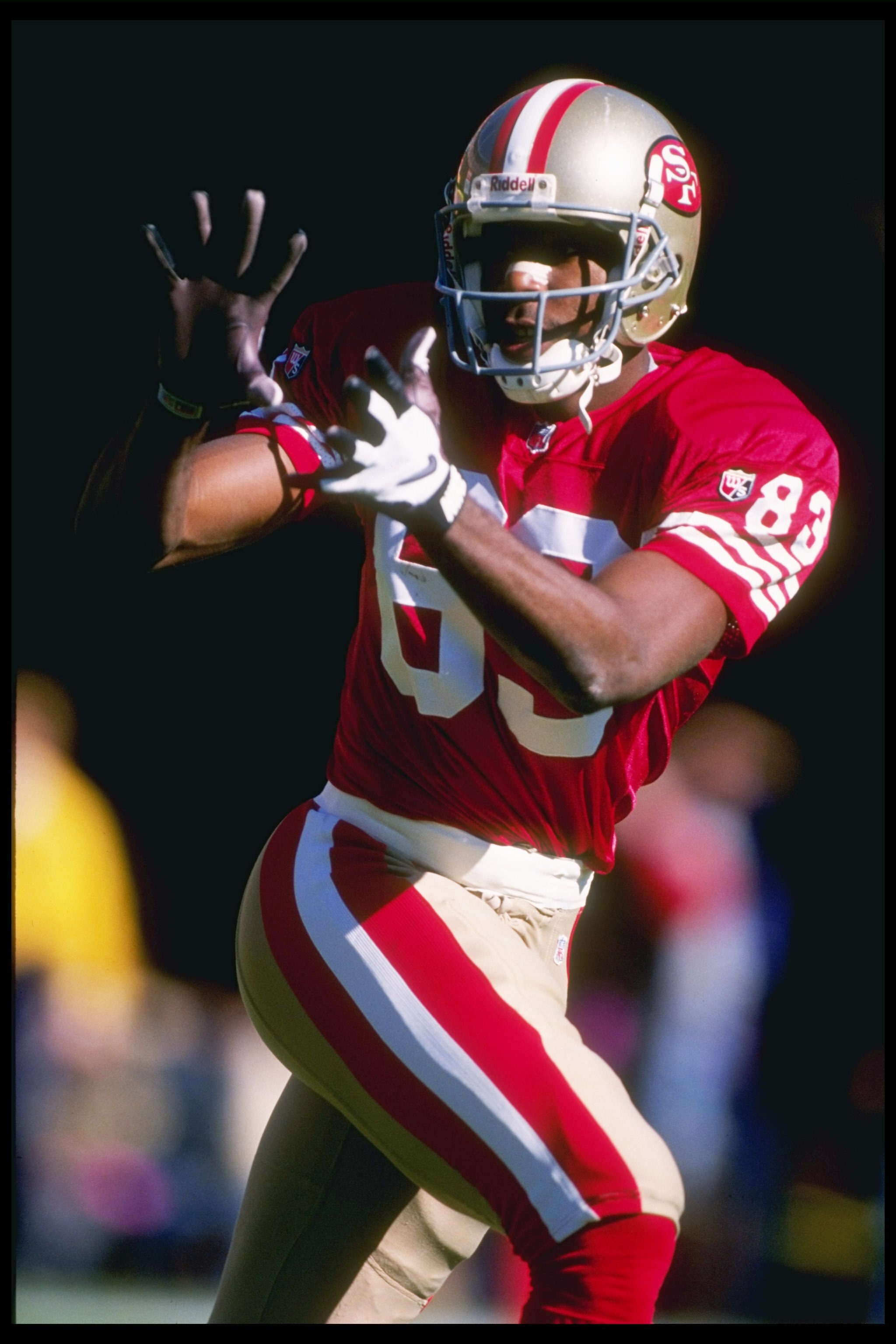5 Nov 1995:  Wide receiver J. J. Stokes of the San Francisco 49ers looks to catch the ball during a game against the Carolina Panthers at 3Com Park in San Francisco, California.  The Panthers won the game, 13-7. Mandatory Credit: Al Bello  /Allsport