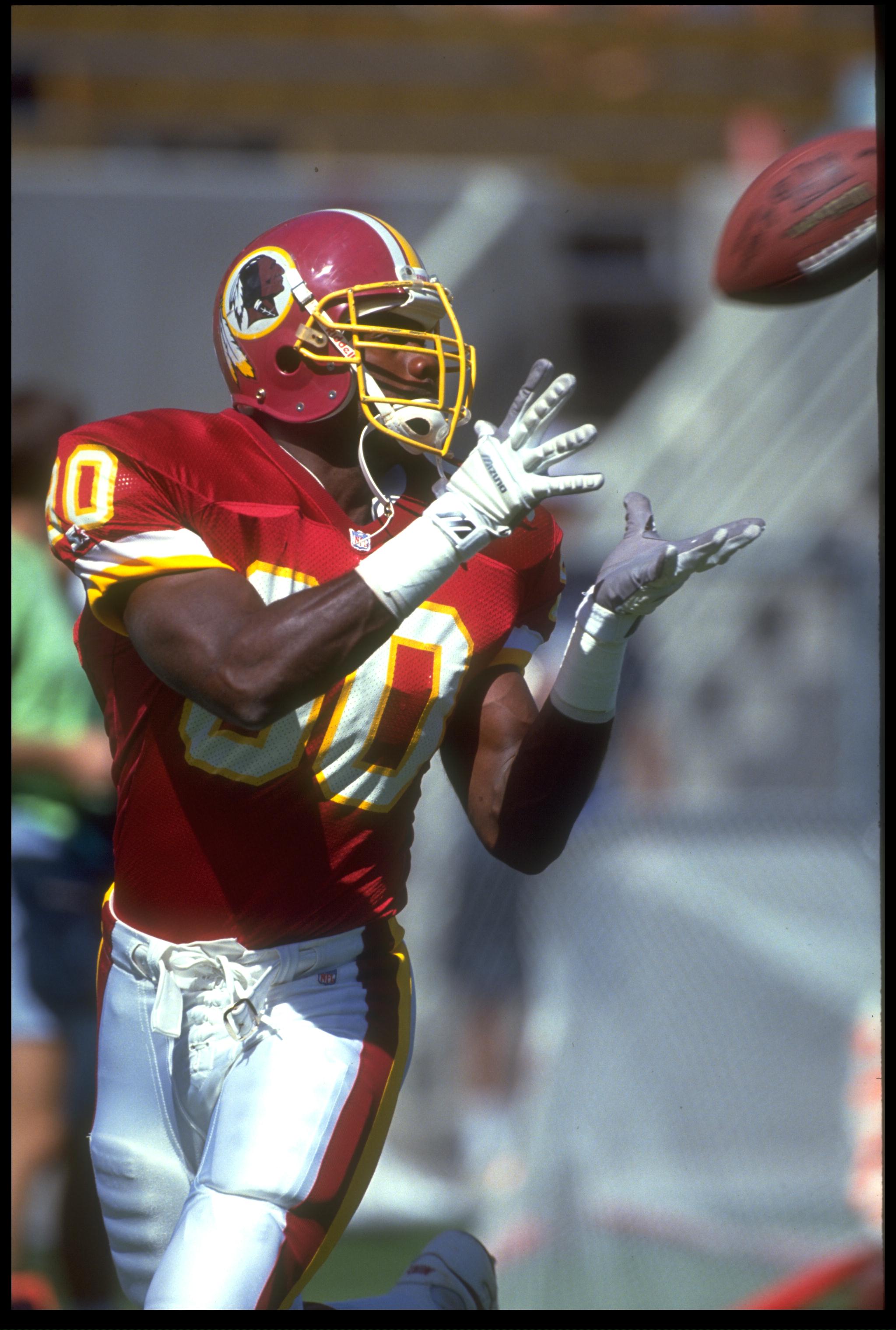 PHOENIX - OCTOBER 4: Desmond Howard #80 of the Washington Redskins catches a pass during the game against the Phoenix Cardinal at Sun Devil Stadium in Tempe, Arizona, October 4, 1992. (Photo by Mike Powell/Getty Images)