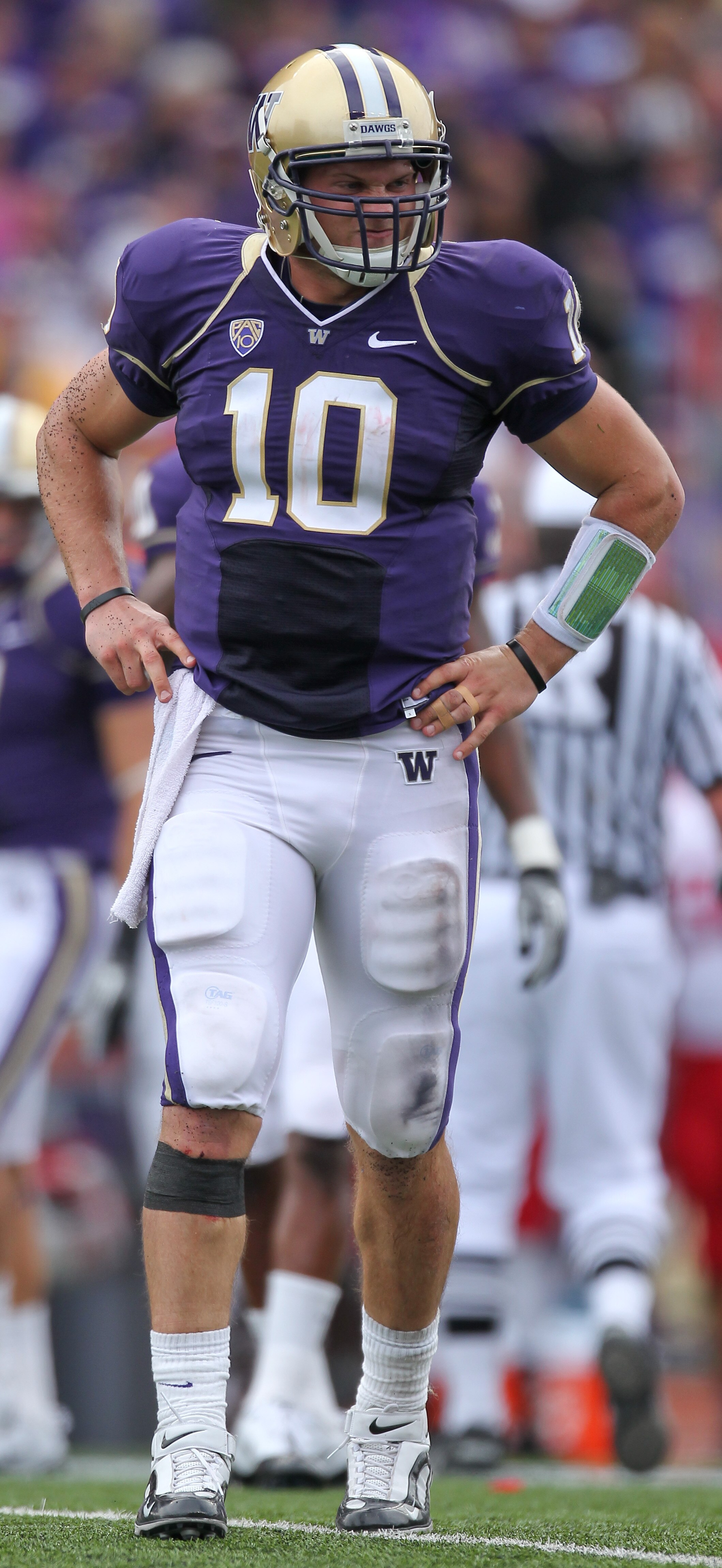 SEATTLE - SEPTEMBER 18: Quarterback Jake Locker #10 of the Washington Huskies grimaces after being tackled during the game against the Nebraska Cornhuskers on September 18, 2010 at Husky Stadium in Seattle, Washington. (Photo by Otto Greule Jr/Getty Image