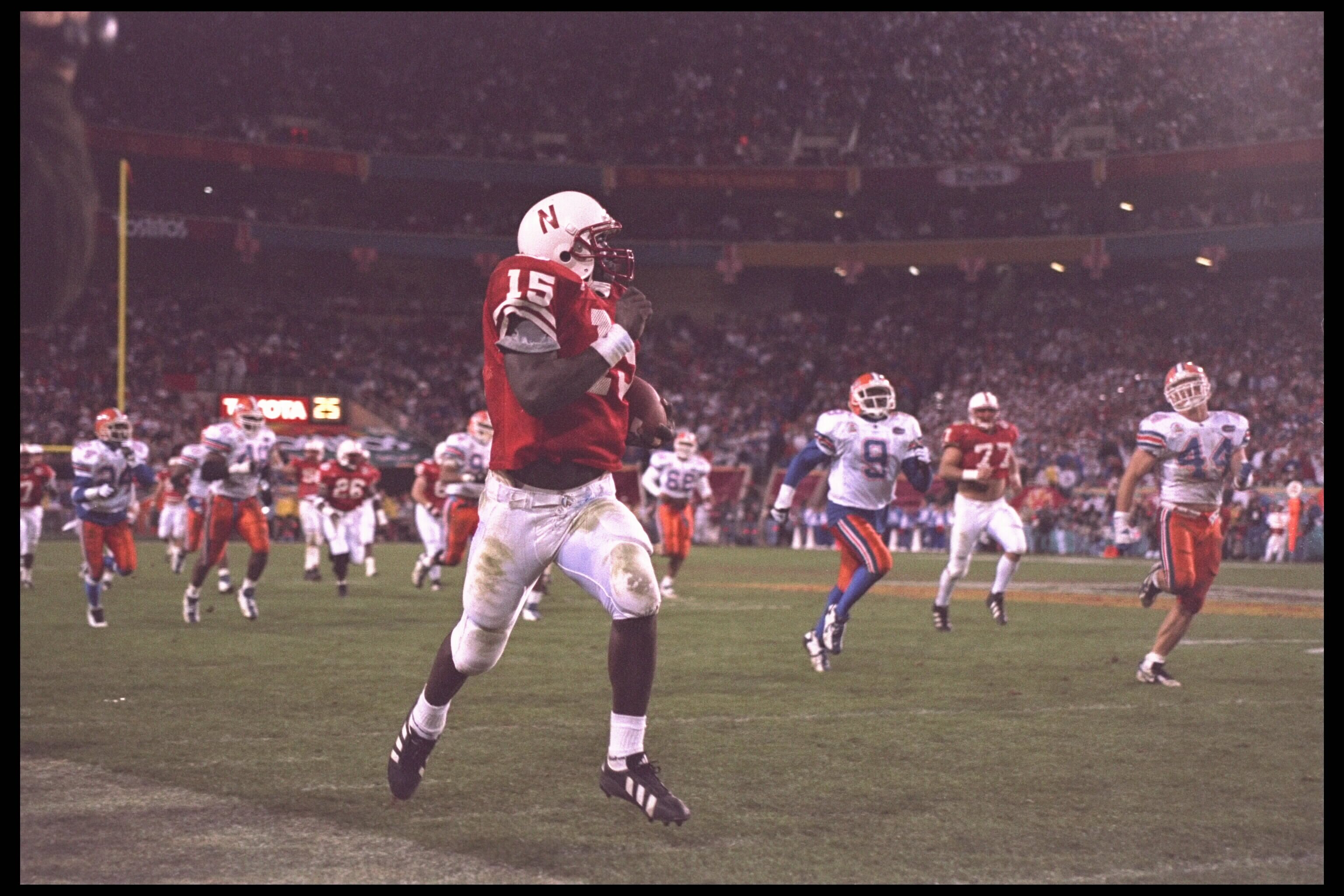 2 Jan 1996:  Quarterback Tommie Frazier #15 of the Florida Gators takes his quarterback keeper to the endzone for a score against the Nebraska Cornhuskers in the Fiesta Bowl at Sun Devil Stadium in Tempe, Arizona.  Nebraska defeated Florida 62-24.    Mand