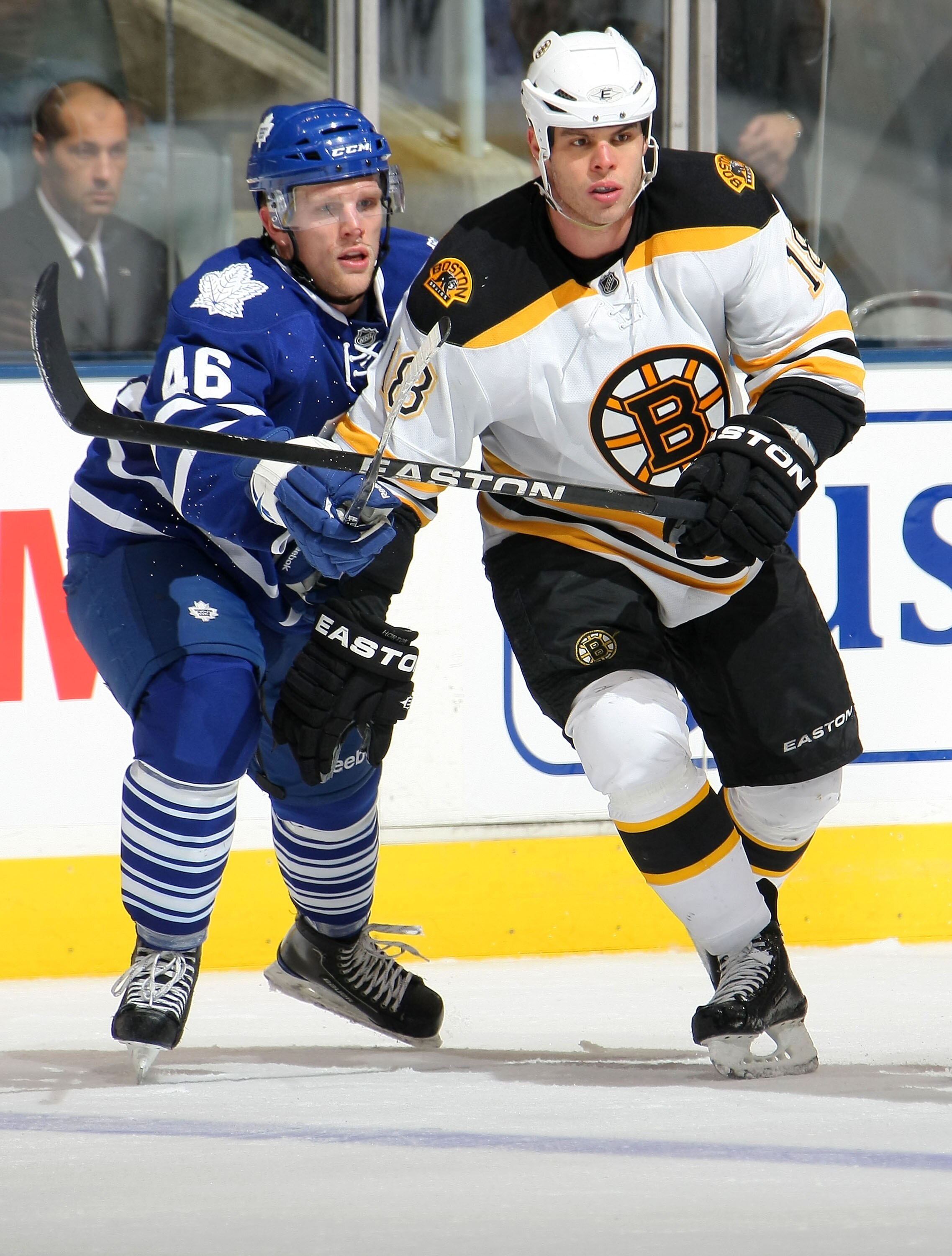 TORONTO,CANADA - JANUARY 3:  Nathan Horton #18 of the Boston Bruins keeps an eye on the play as does David Krejci #46 of the Toronto Maple Leafs during their NHL game at Air Canada Centre on January 3, 2011 in Toronto, Ontario, Canada.(Photo By Dave Sandf