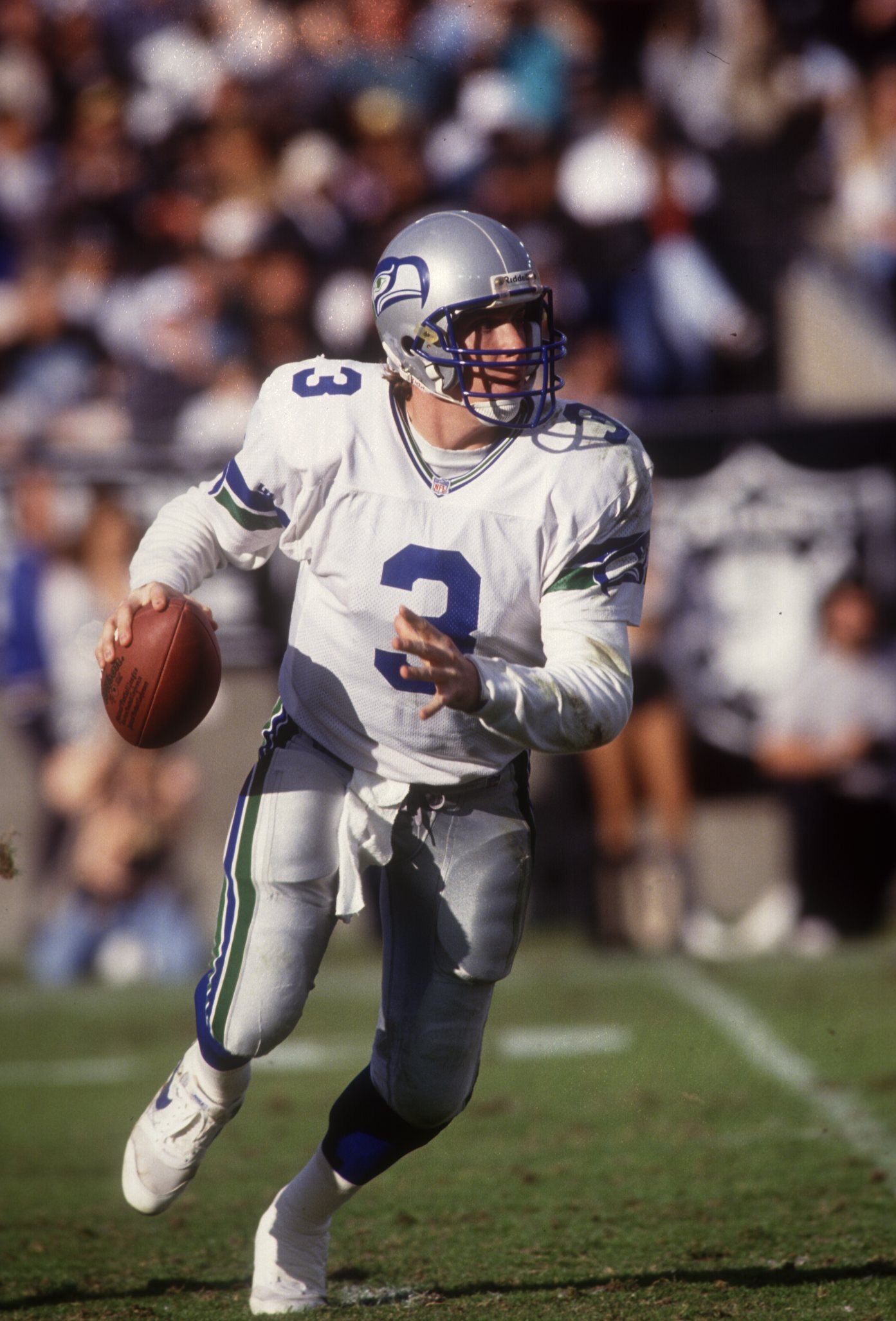 RICK MIRER, SEATTLE SEAHAWKS QUARTERBACK, SCRAMBLES LOOKS FOR AN OPEN RECEIVER DURING THE SEAHAWKS 23-27 LOSS TO THE RAIDERS IN LOS ANGELES. Mandatory Credit: Stephen Dunn/ALLSPORT