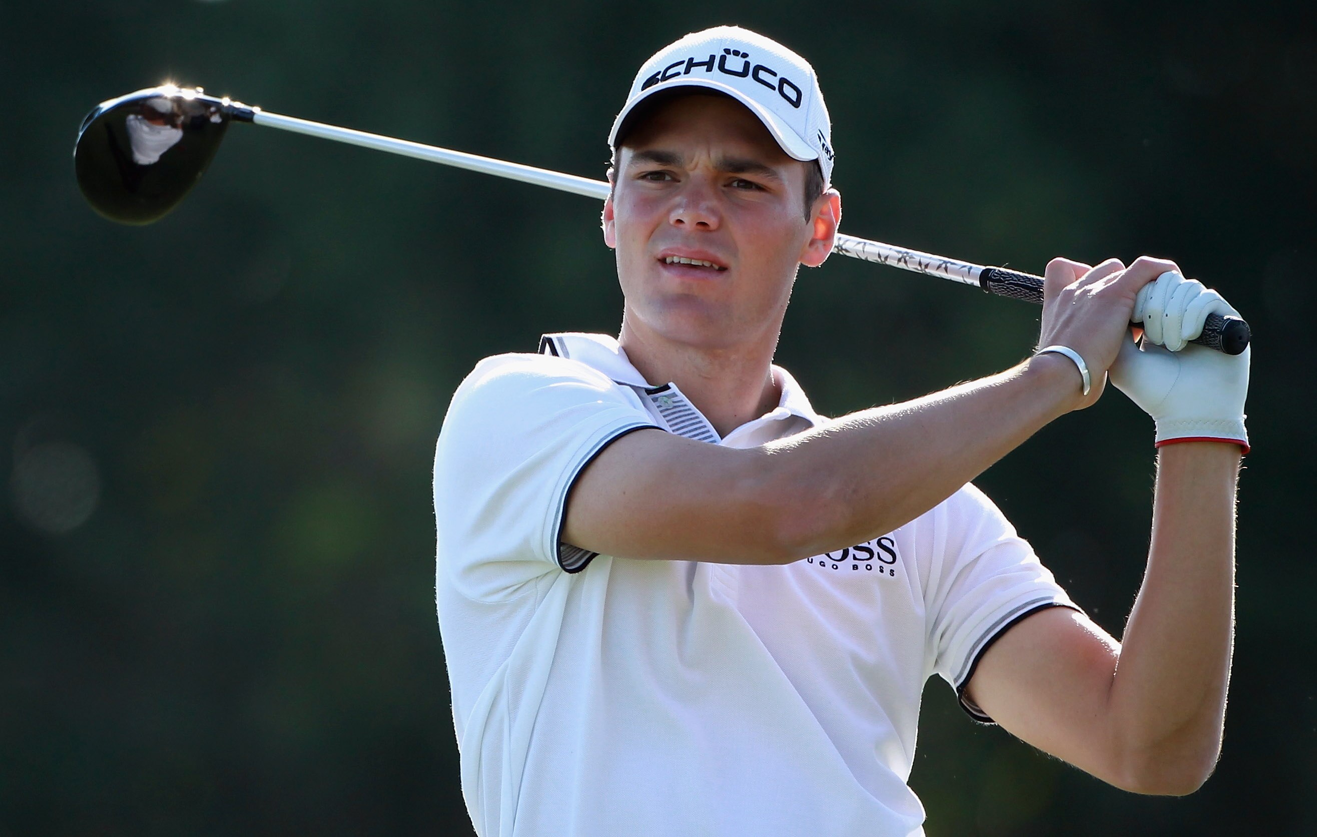 DOHA, QATAR - FEBRUARY 04:  Martin Kaymer of Germany hits his tee-shot on the 14th hole during the second round of the Commercialbank Qatar Masters held at Doha Golf Club on February 4, 2011 in Doha, Qatar.  (Photo by Andrew Redington/Getty Images)
