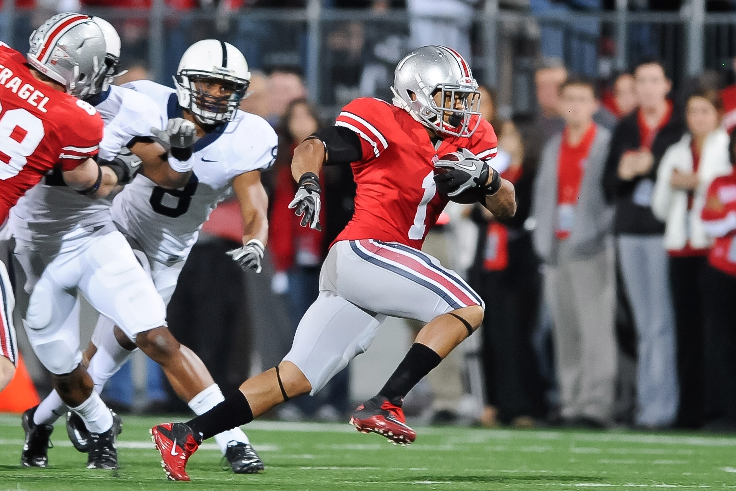 COLUMBUS, OH - NOVEMBER 13:  Dan Herron #1 of the Ohio State Buckeyes runs with the ball against the Penn State Nittany Lions at Ohio Stadium on November 13, 2010 in Columbus, Ohio.  (Photo by Jamie Sabau/Getty Images)