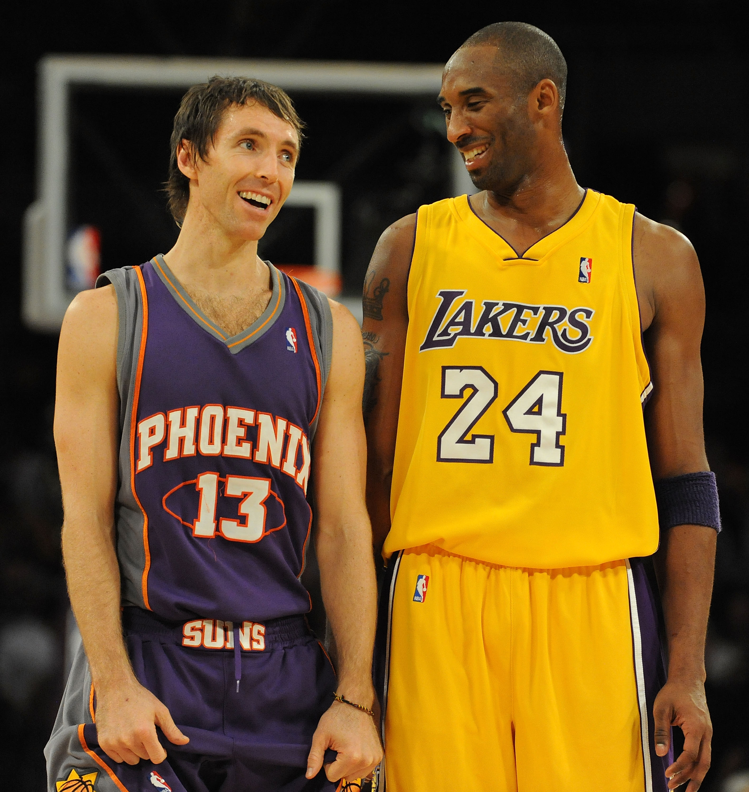 LOS ANGELES, CA - DECEMBER 10:  Steve Nash #13 of the Phoenix Suns laughs with Kobe Bryant #24 of the Los Angeles Lakers during the second half at the Staples Center on December, 10 2008 in Los Angeles, California.   NOTE TO USER: User expressly acknowled