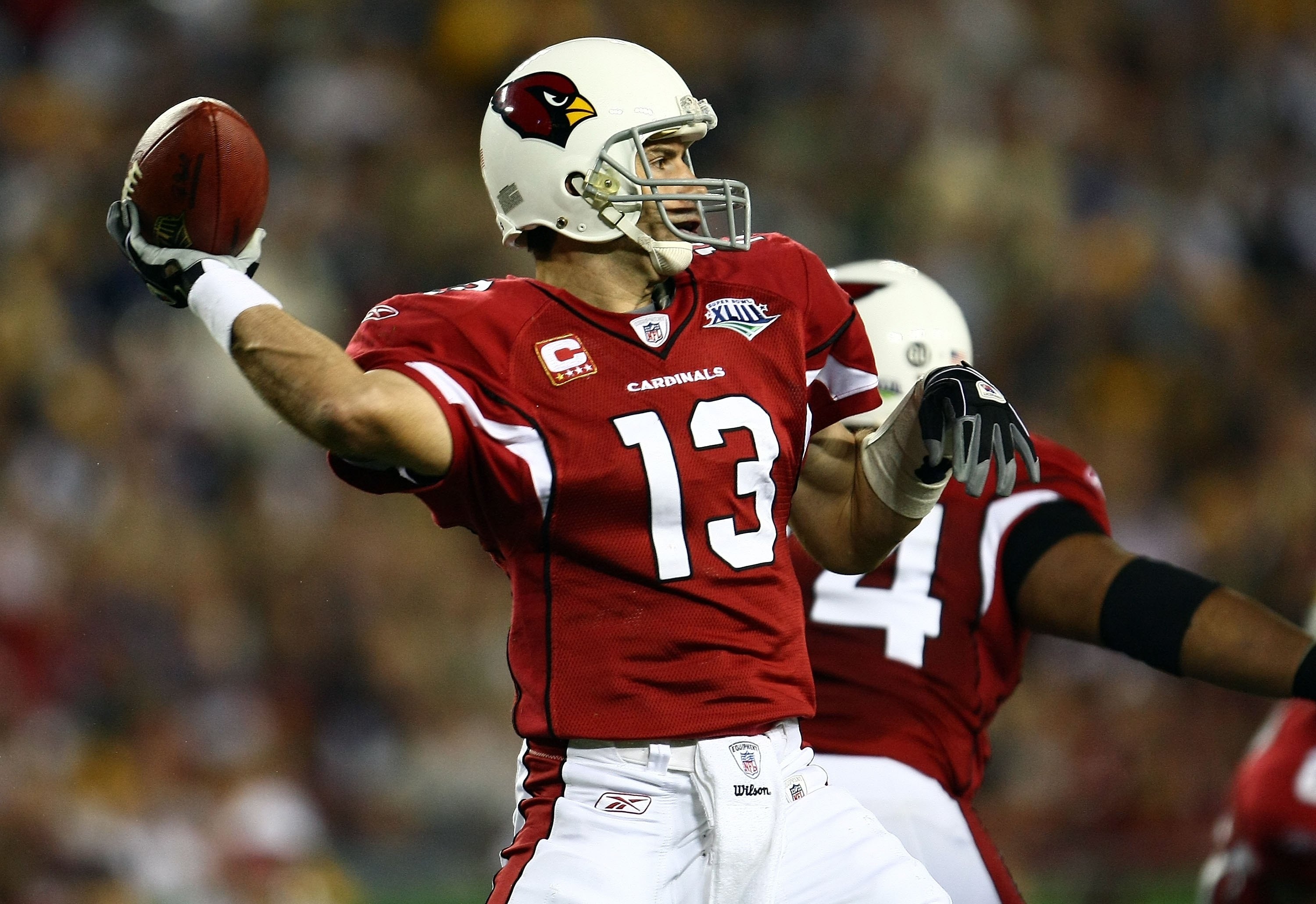 TAMPA, FL - FEBRUARY 01:  Quarterback Kurt Warner #13 of the Arizona Cardinals throws the ball against the Pittsburgh Steelers during Super Bowl XLIII on February 1, 2009 at Raymond James Stadium in Tampa, Florida.  (Photo by Chris McGrath/Getty Images)