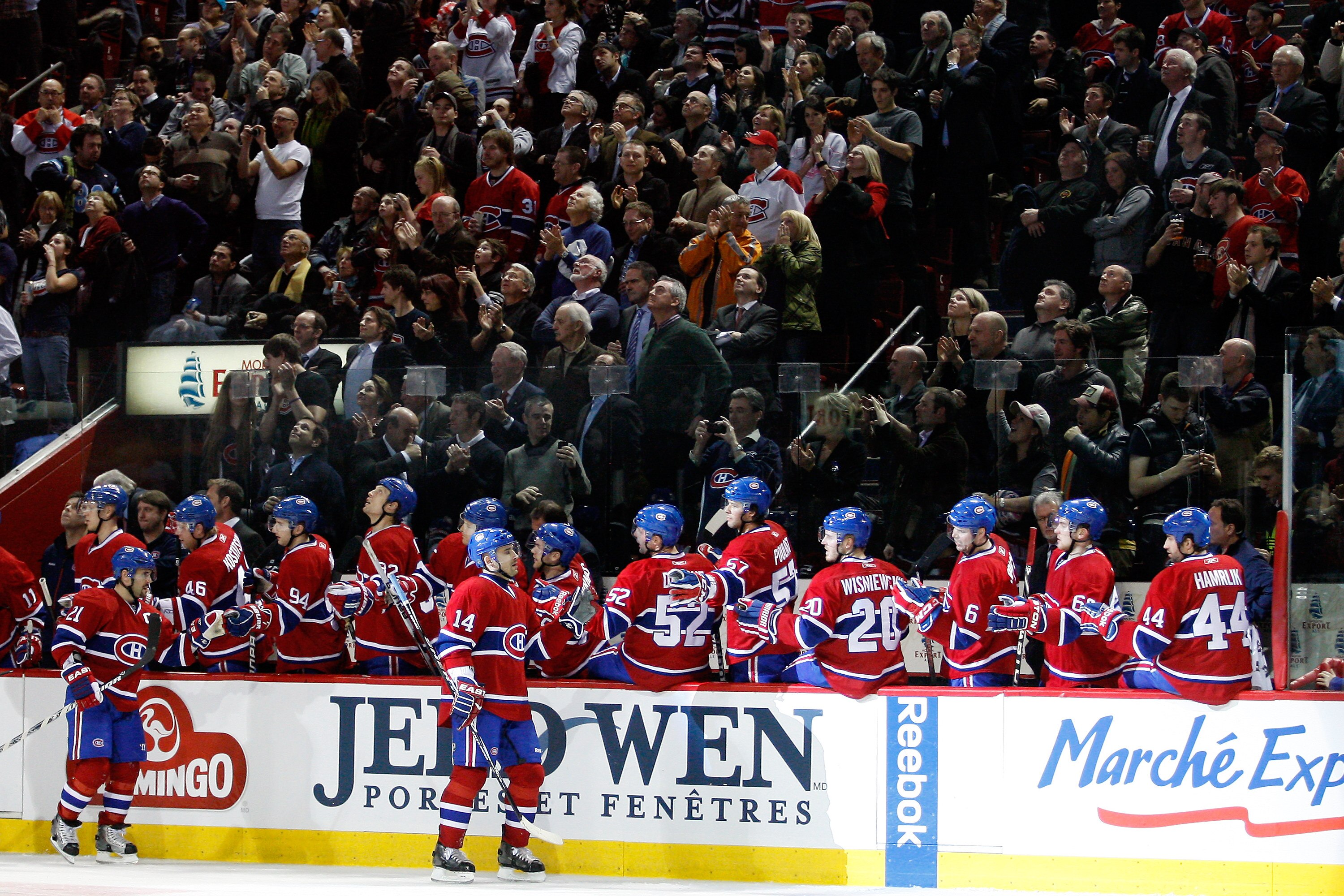 MONTREAL, CANADA - FEBRUARY 2:  Tomas Plekanec #14 of the Montreal Canadiens celebrates his third-period goal with teammates during the NHL game against the Florida Panthers at the Bell Centre on February 2, 2011 in Montreal, Quebec, Canada.  The Canadien