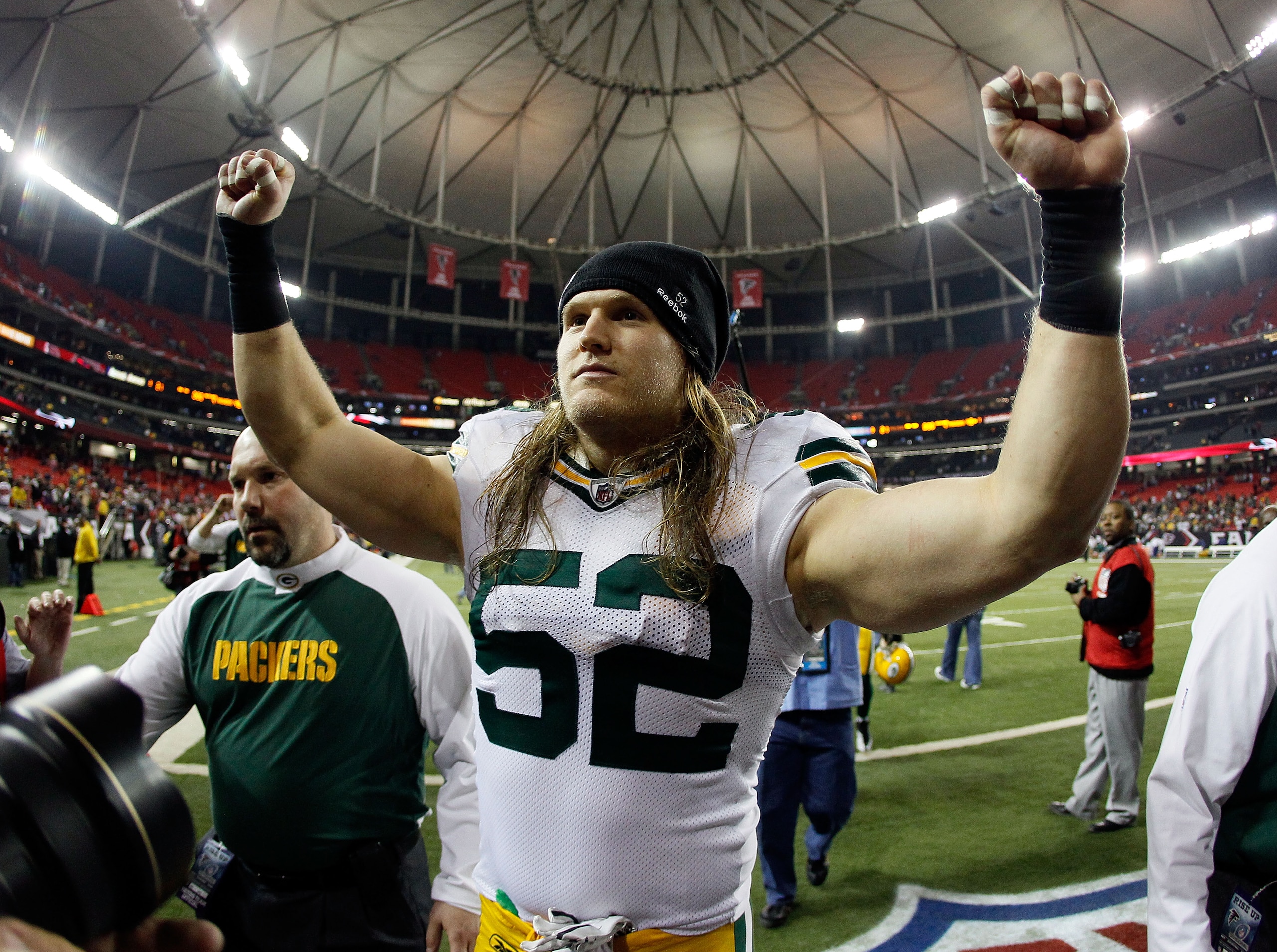 ATLANTA, GA - JANUARY 15:  Clay Matthews #52 of the Green Bay Packers celebrates as he walks off the field after the Packers won 48-21 against the Atlanta Falcons during their 2011 NFC divisional playoff game at Georgia Dome on January 15, 2011 in Atlanta